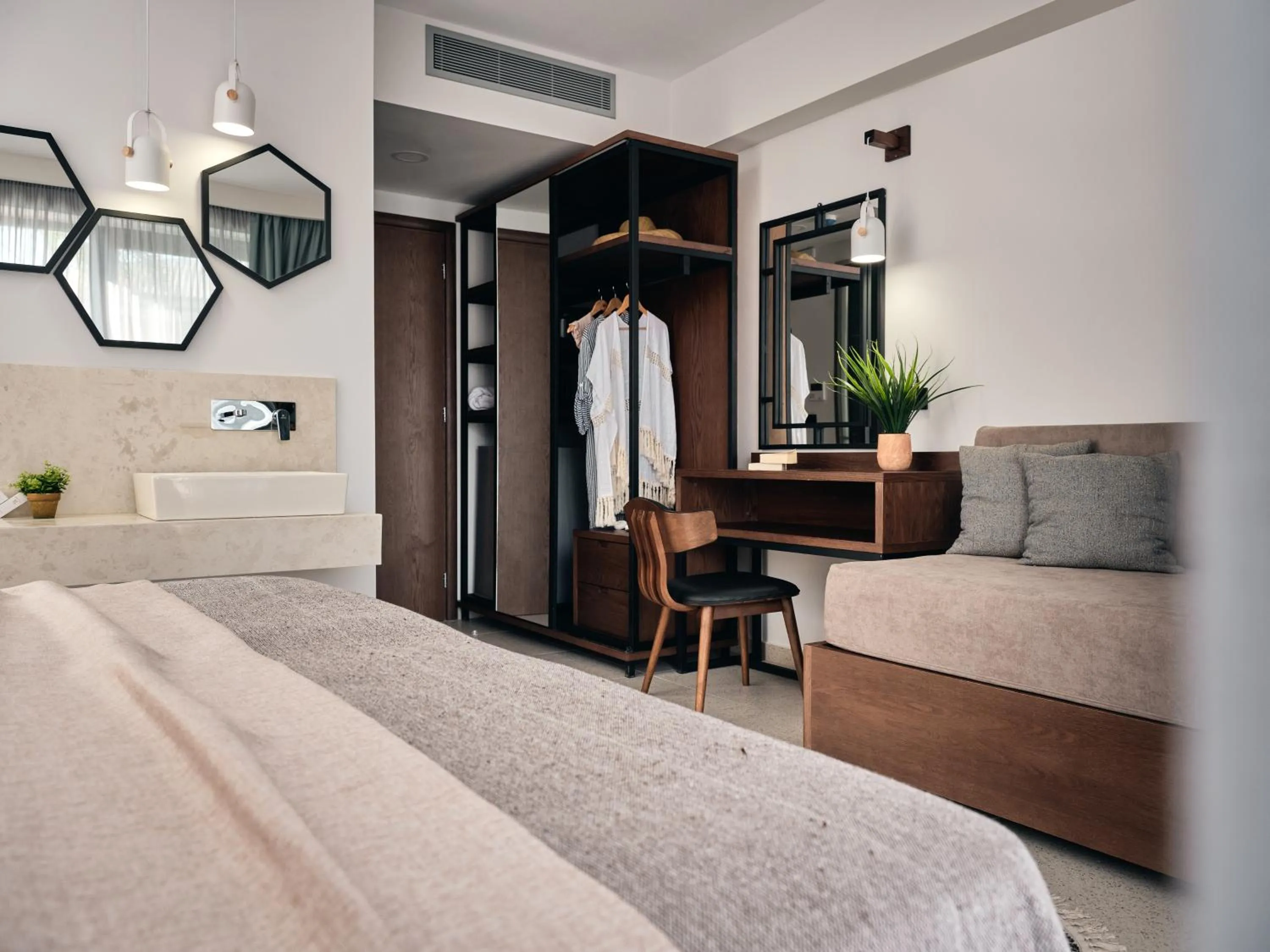 Seating area, Bed in Letsos Hotel