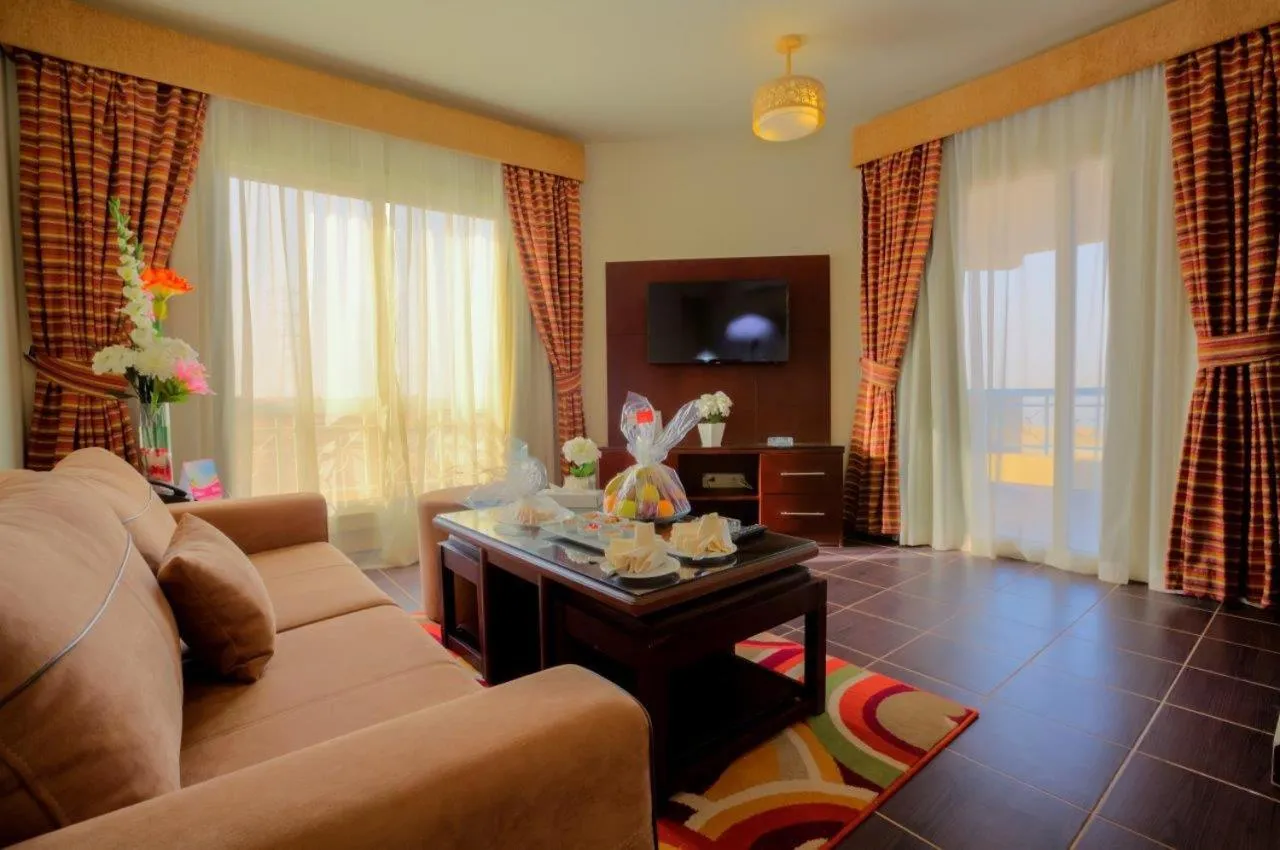 Seating area in Porto South Beach by Amer Group - Families only