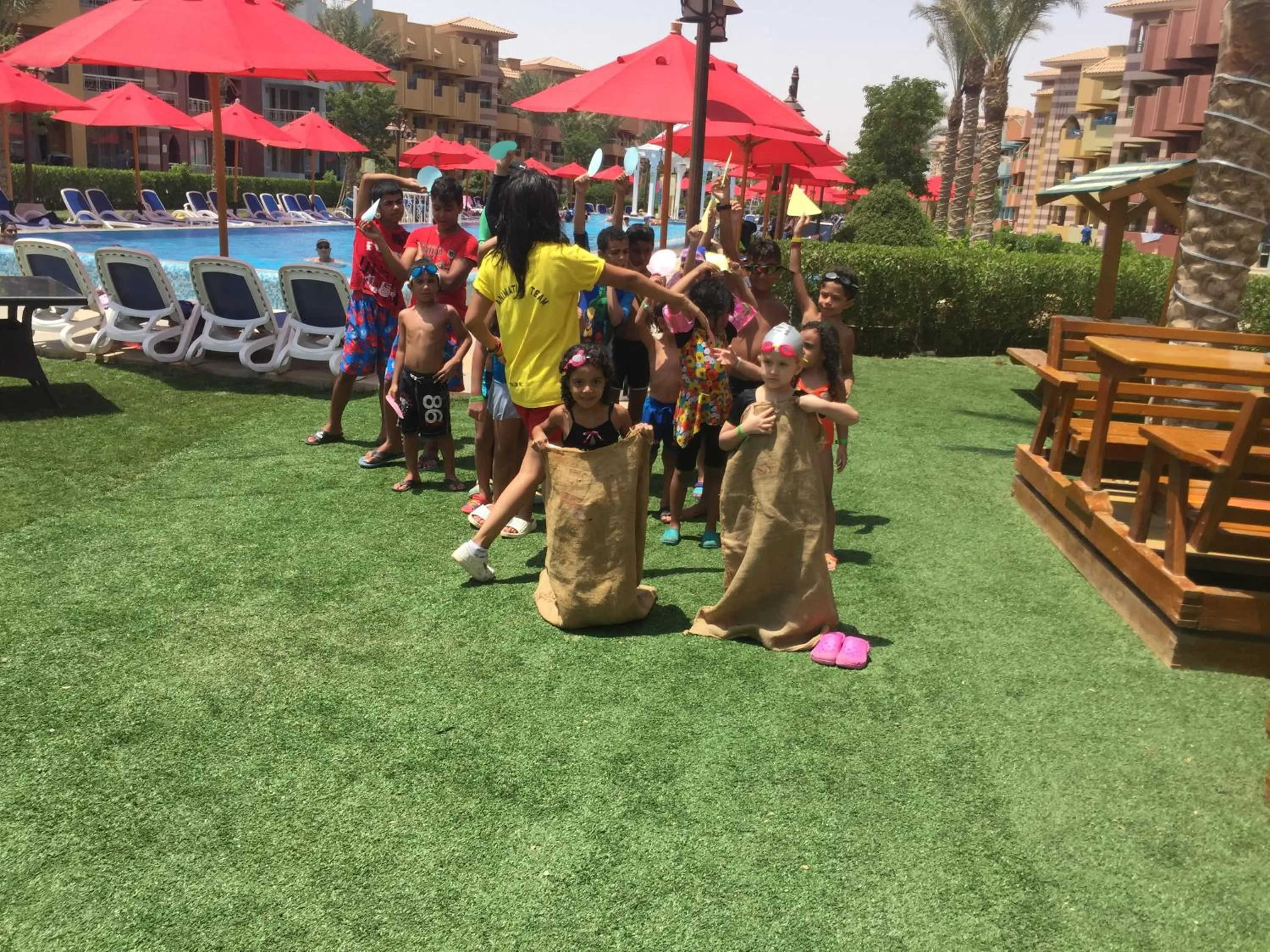 People in Porto South Beach by Amer Group - Families only