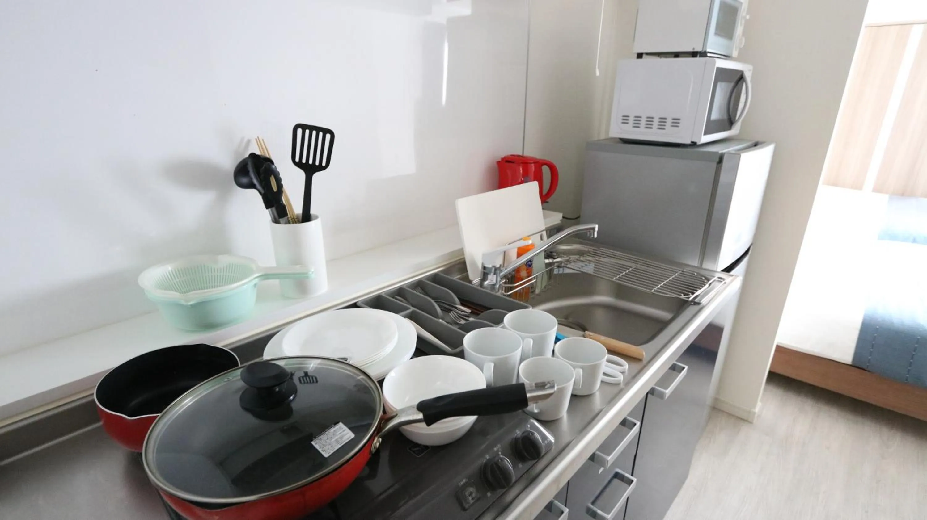 Kitchen or kitchenette in Legatio HAKATA Station East