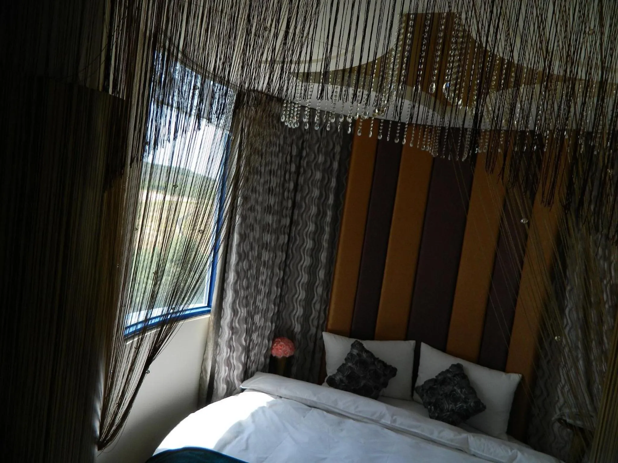 Decorative detail, Bed in The Domed Tile B&B