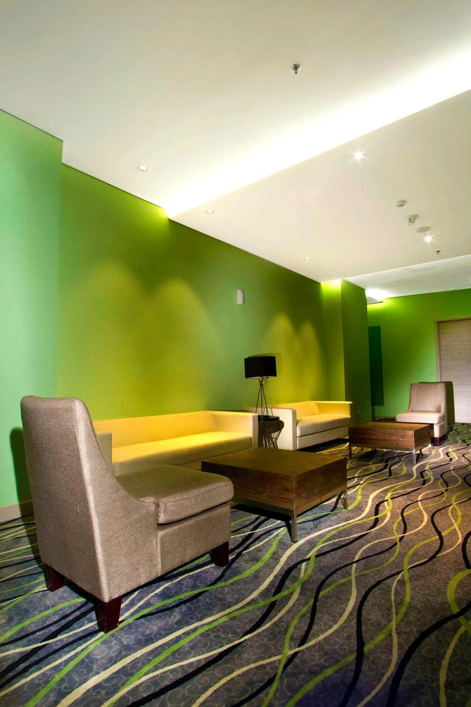 Seating area in Whiz Prime Hotel Kelapa Gading