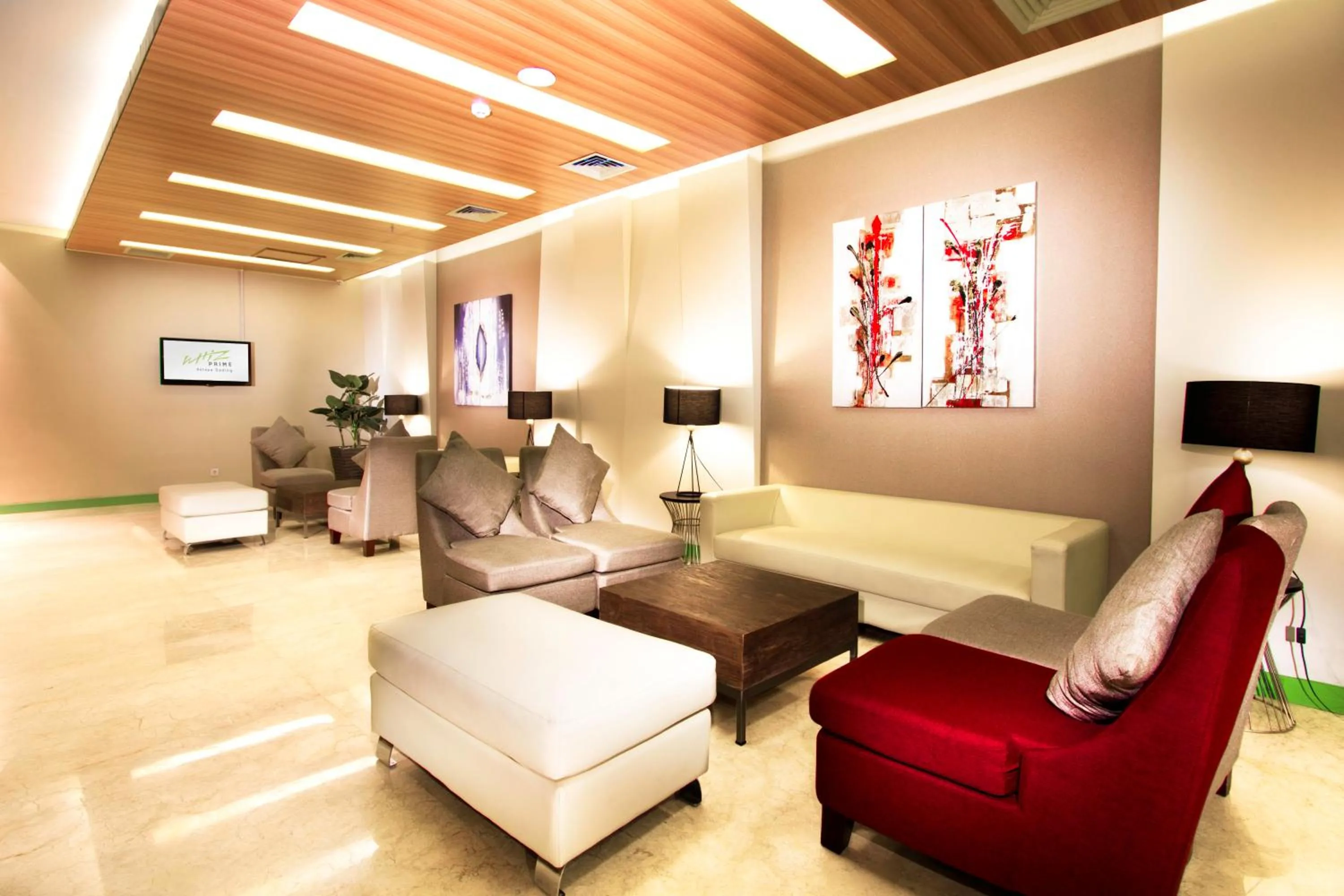 Seating area in Whiz Prime Hotel Kelapa Gading