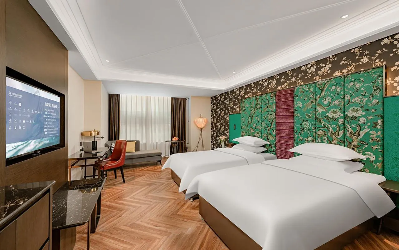 Bed in Metropolo Hotel Xuzhou High-speed Railway Station Jinlonghu