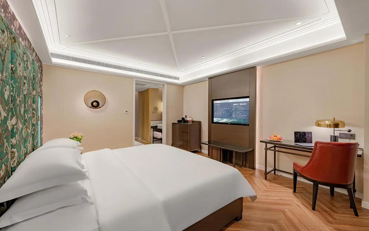 Bed in Metropolo Hotel Xuzhou High-speed Railway Station Jinlonghu