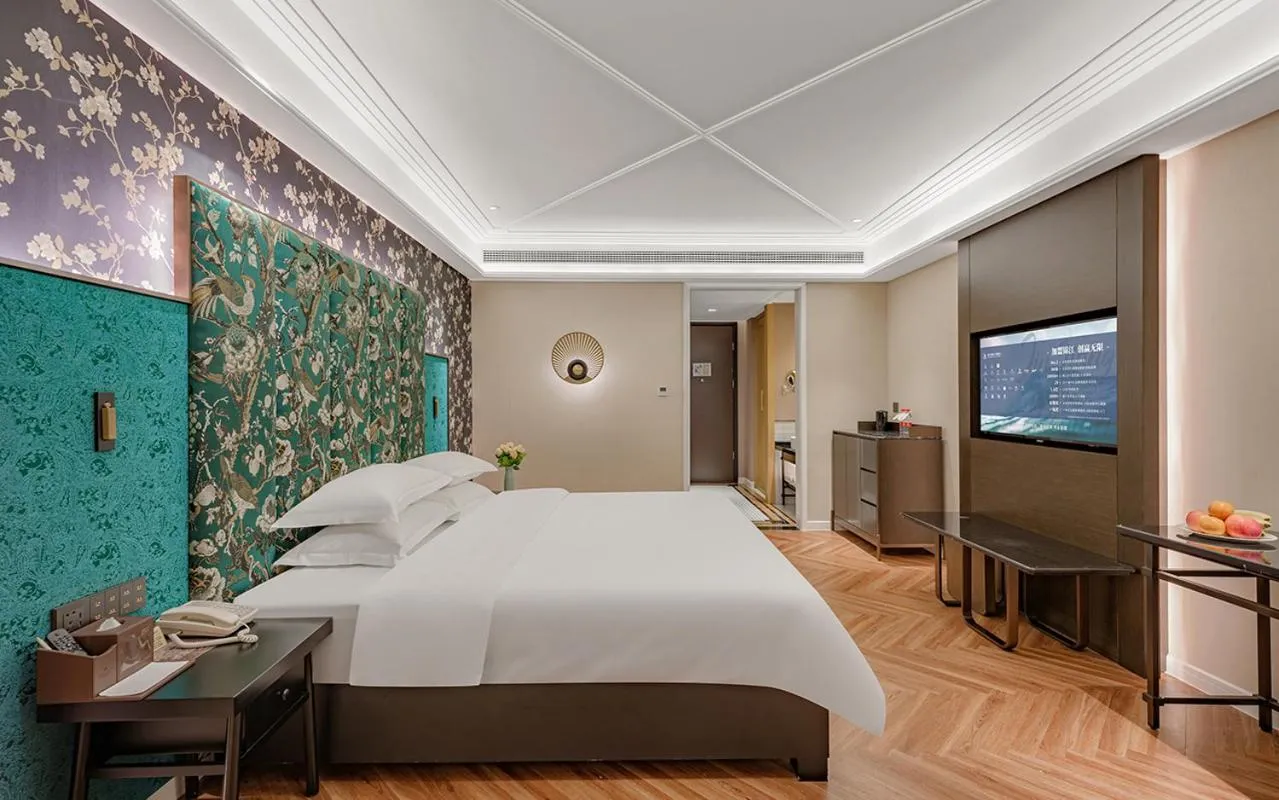 Bed in Metropolo Hotel Xuzhou High-speed Railway Station Jinlonghu