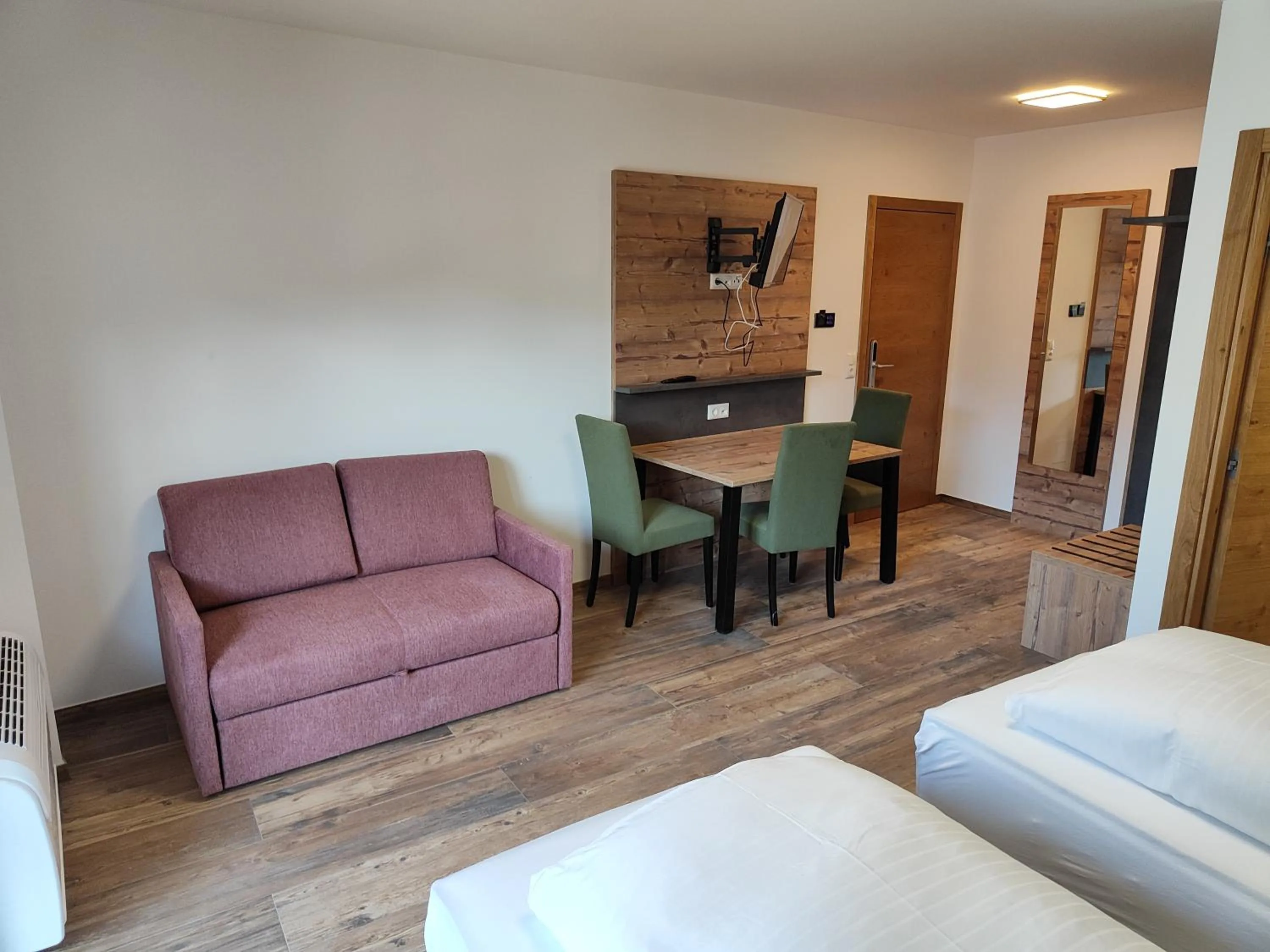 Seating area, Bed in Hotel-Bad Goisern