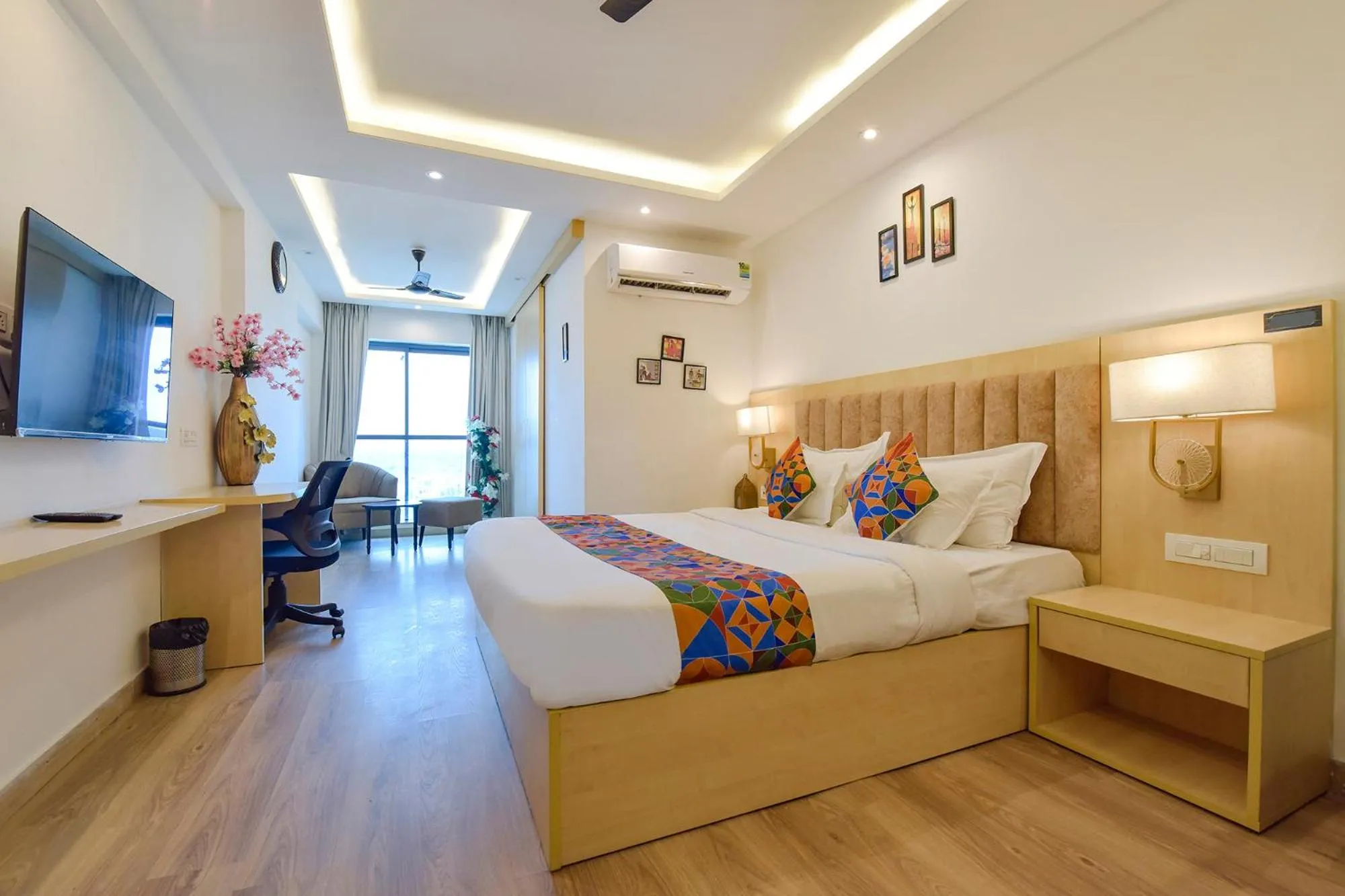 Bedroom, Bed in FabHotel Anukampa With Swimming Pool