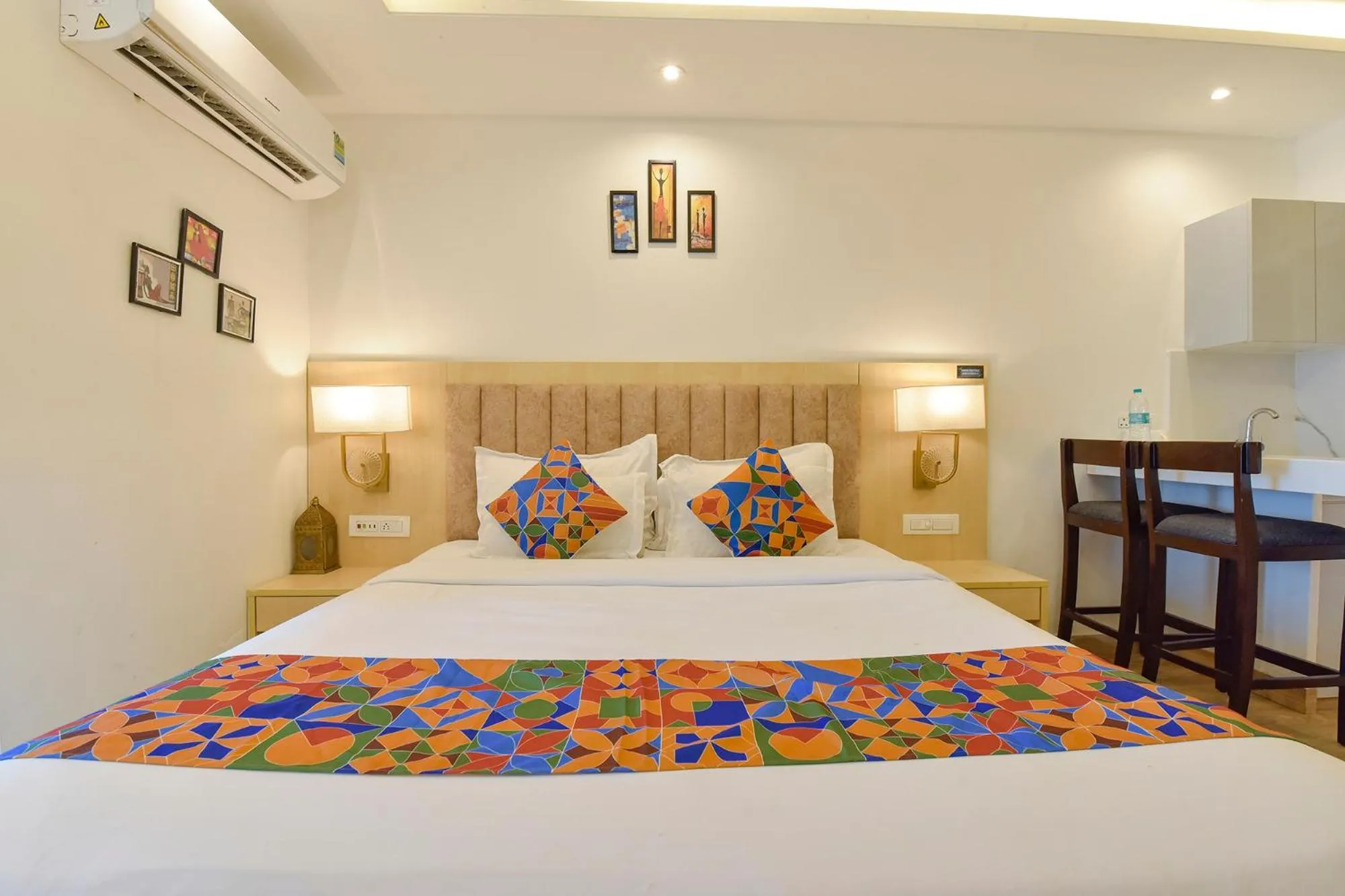 Bed in FabHotel Anukampa With Swimming Pool