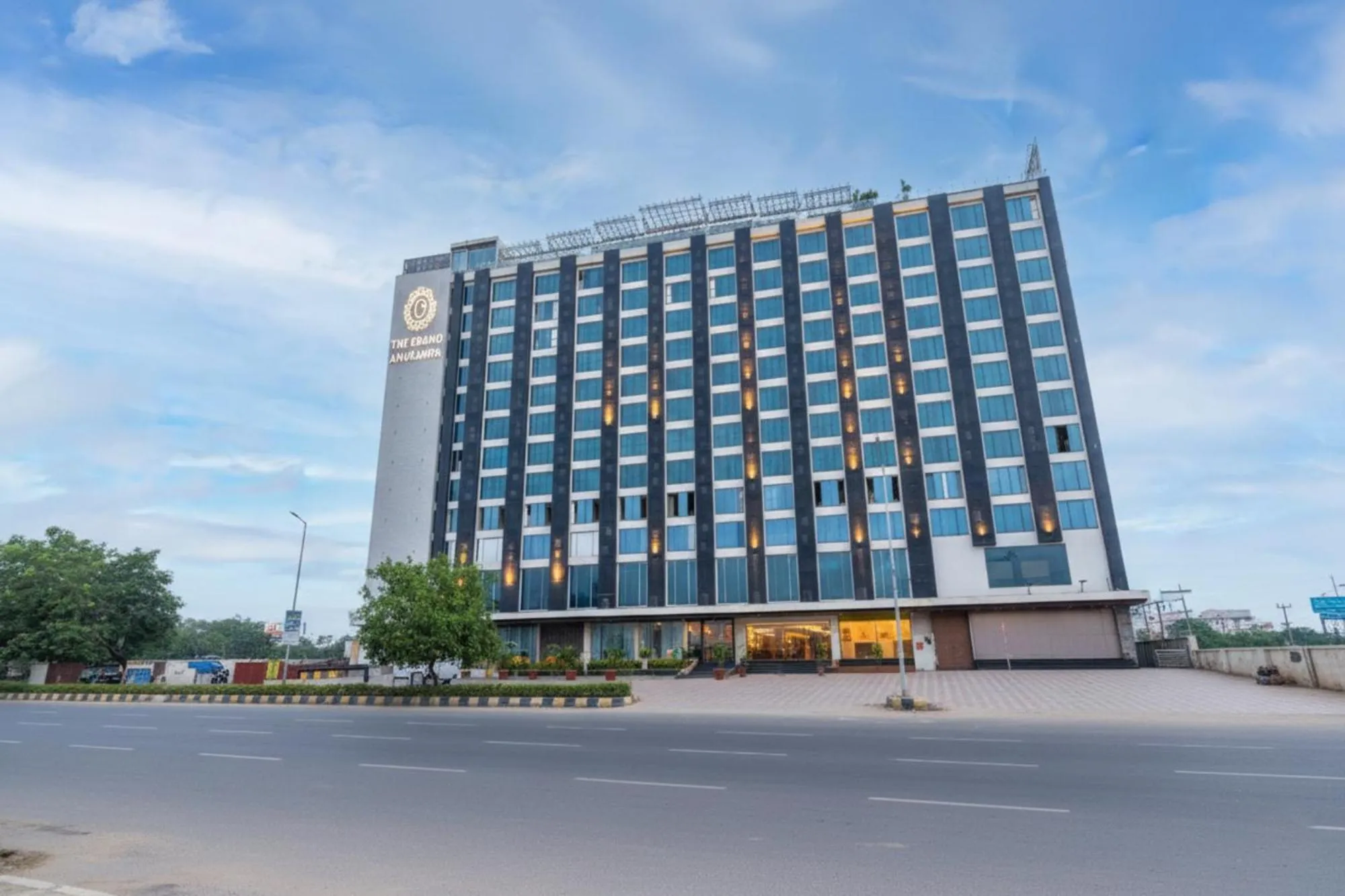 Property building in FabHotel Anukampa With Swimming Pool