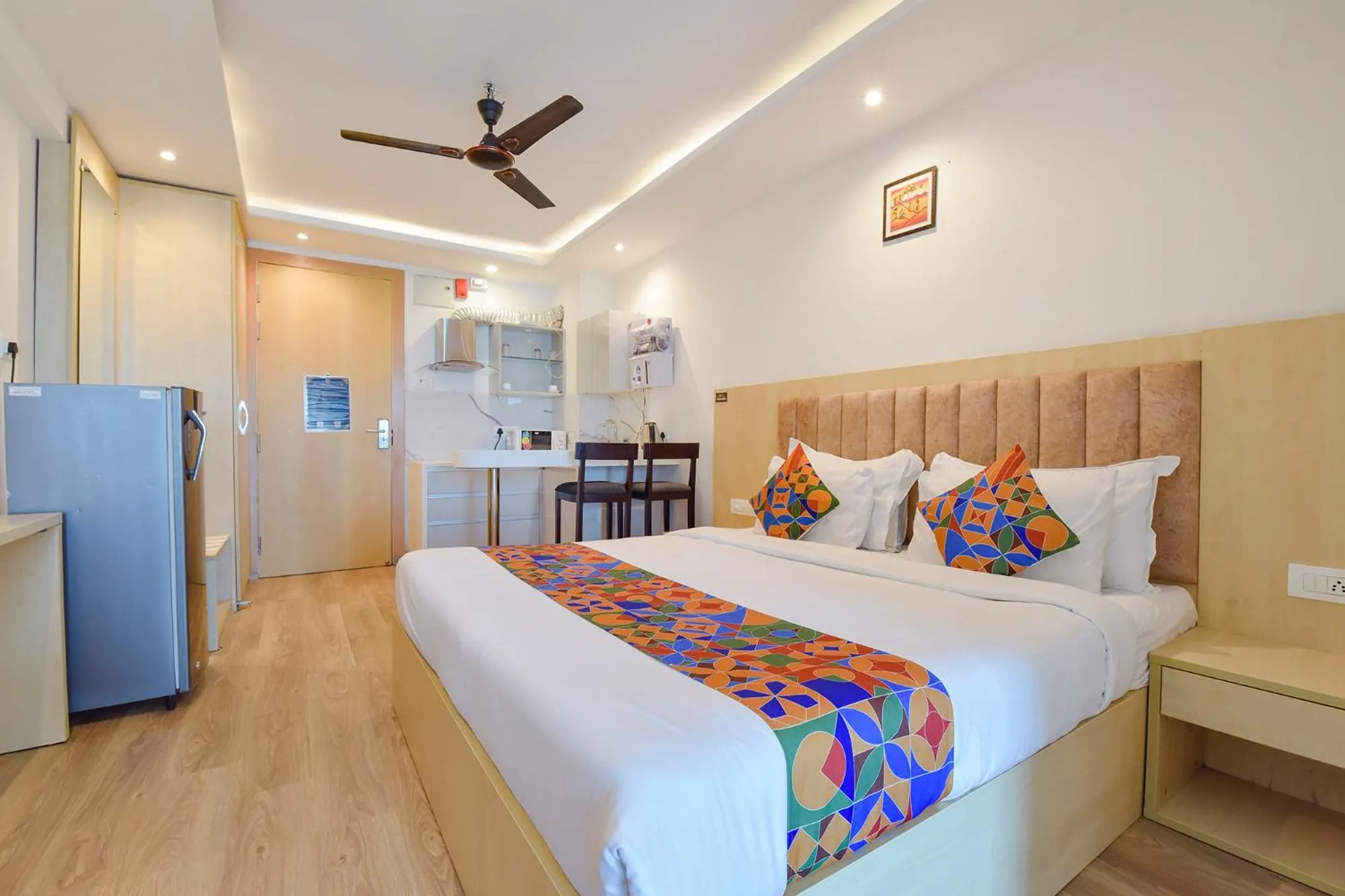 Bed in FabHotel Anukampa With Swimming Pool