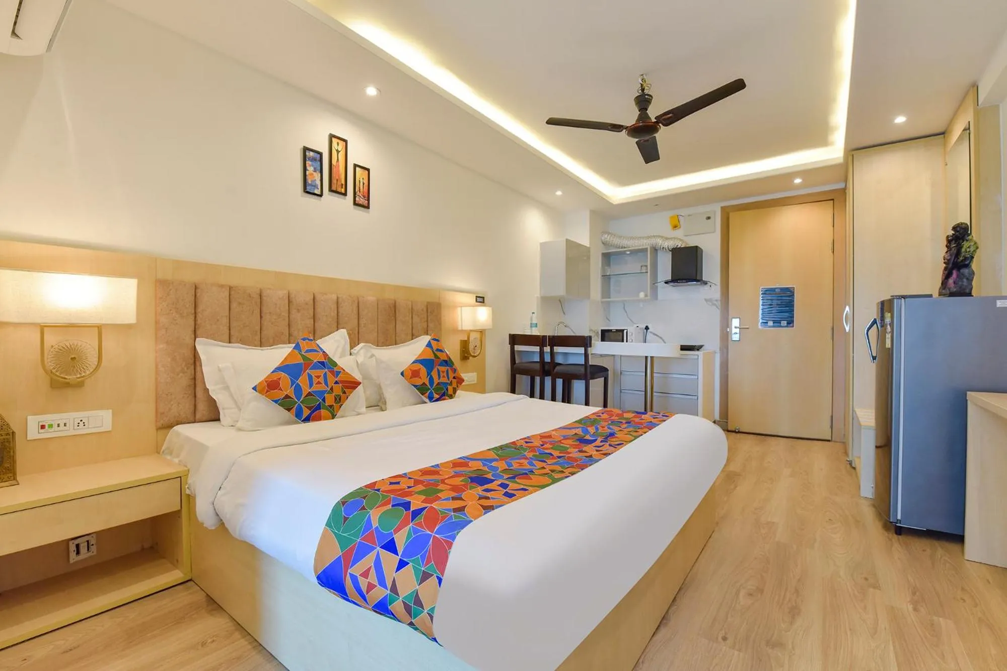 Bed in FabHotel Anukampa With Swimming Pool