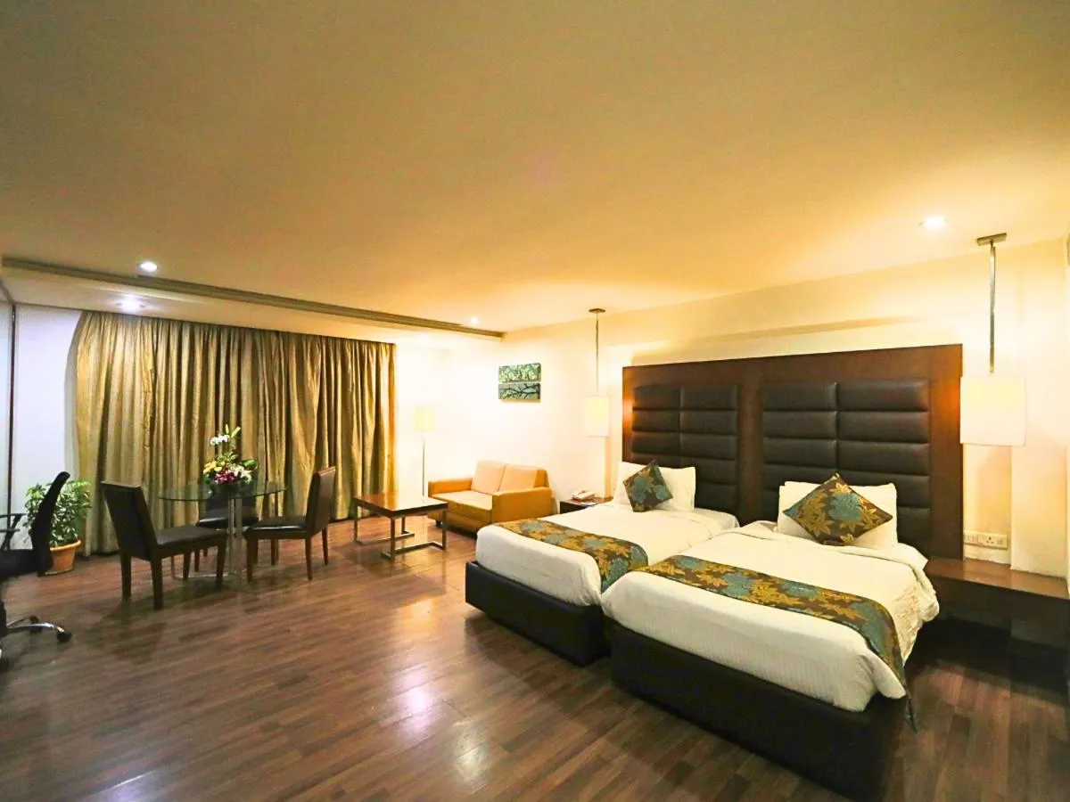 Photo of the whole room, Bed in D R Utthama Nellore - AM Hotel Kollection