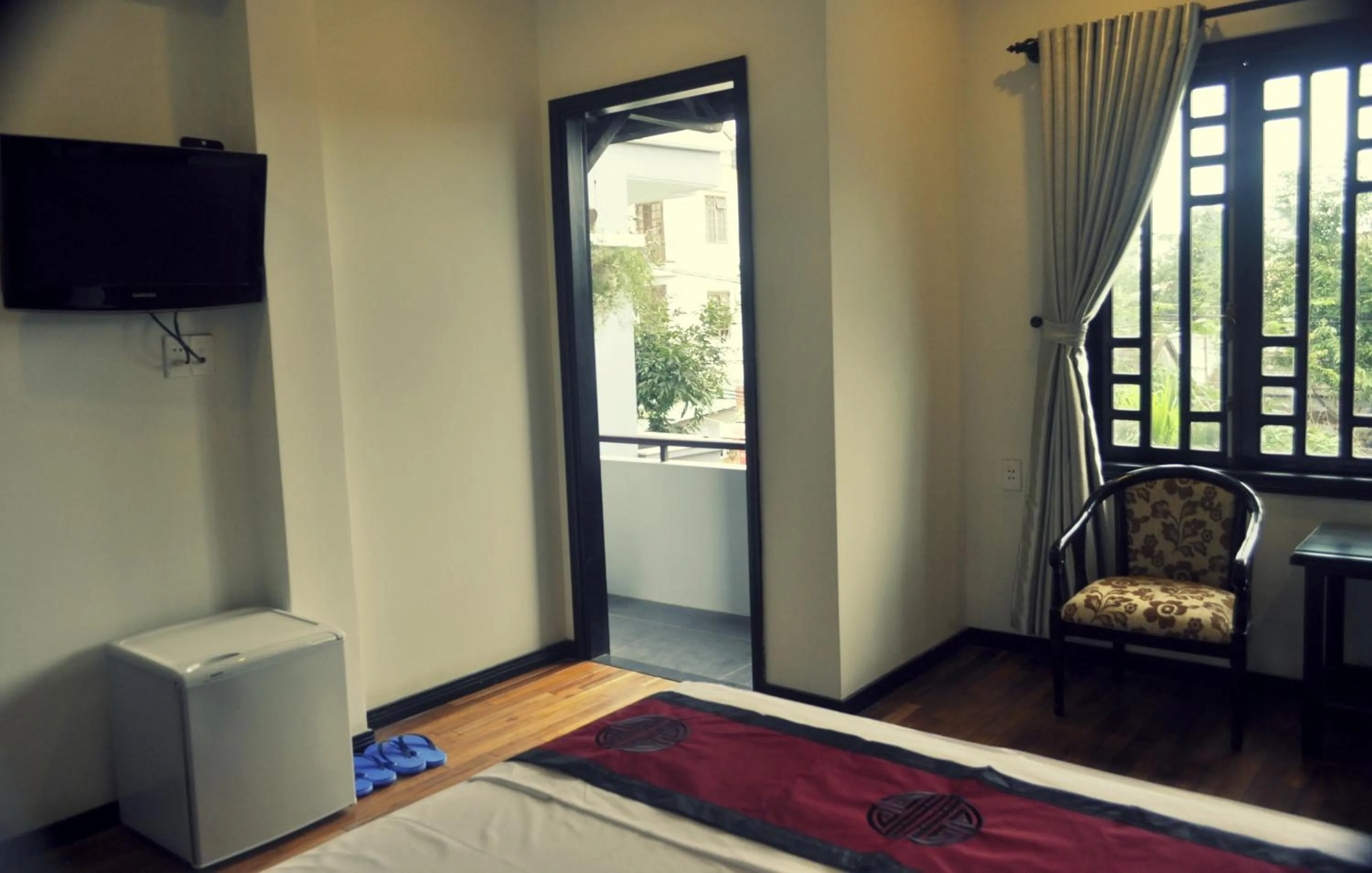 Photo of the whole room, Bed in Green CoCo HomeStay