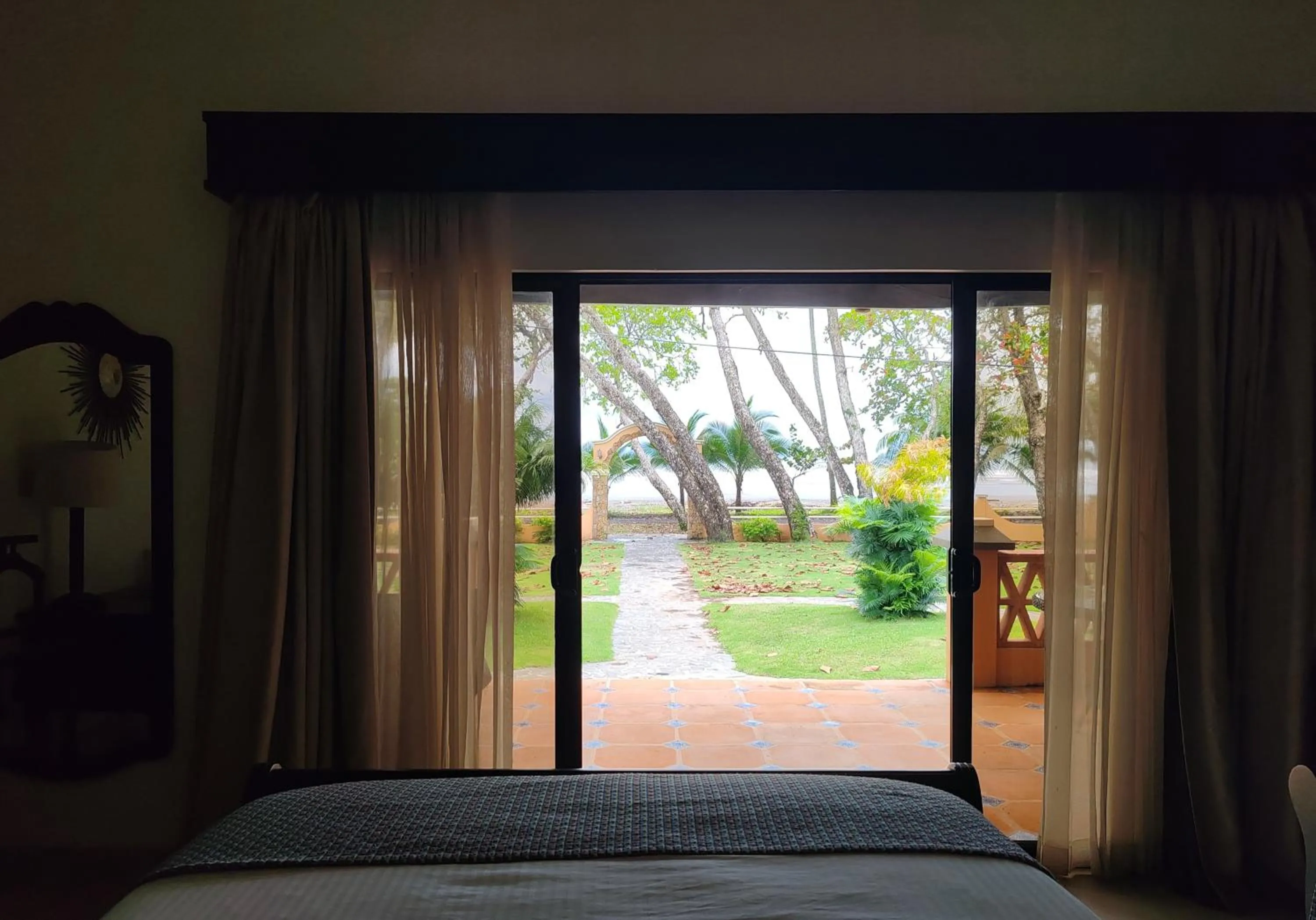 Bed in Marenaz Oceanfront Resort