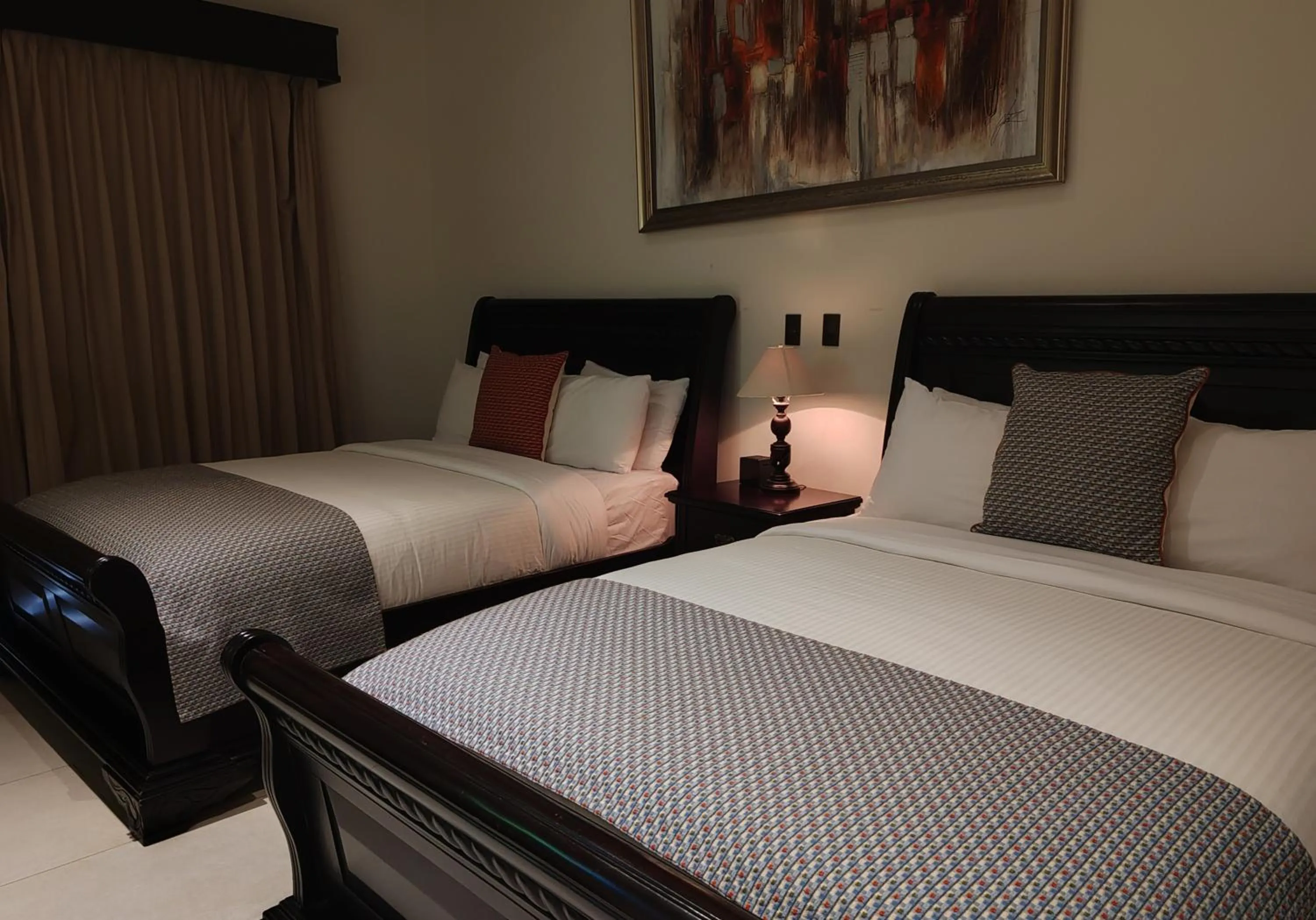 Bed in Marenaz Oceanfront Resort