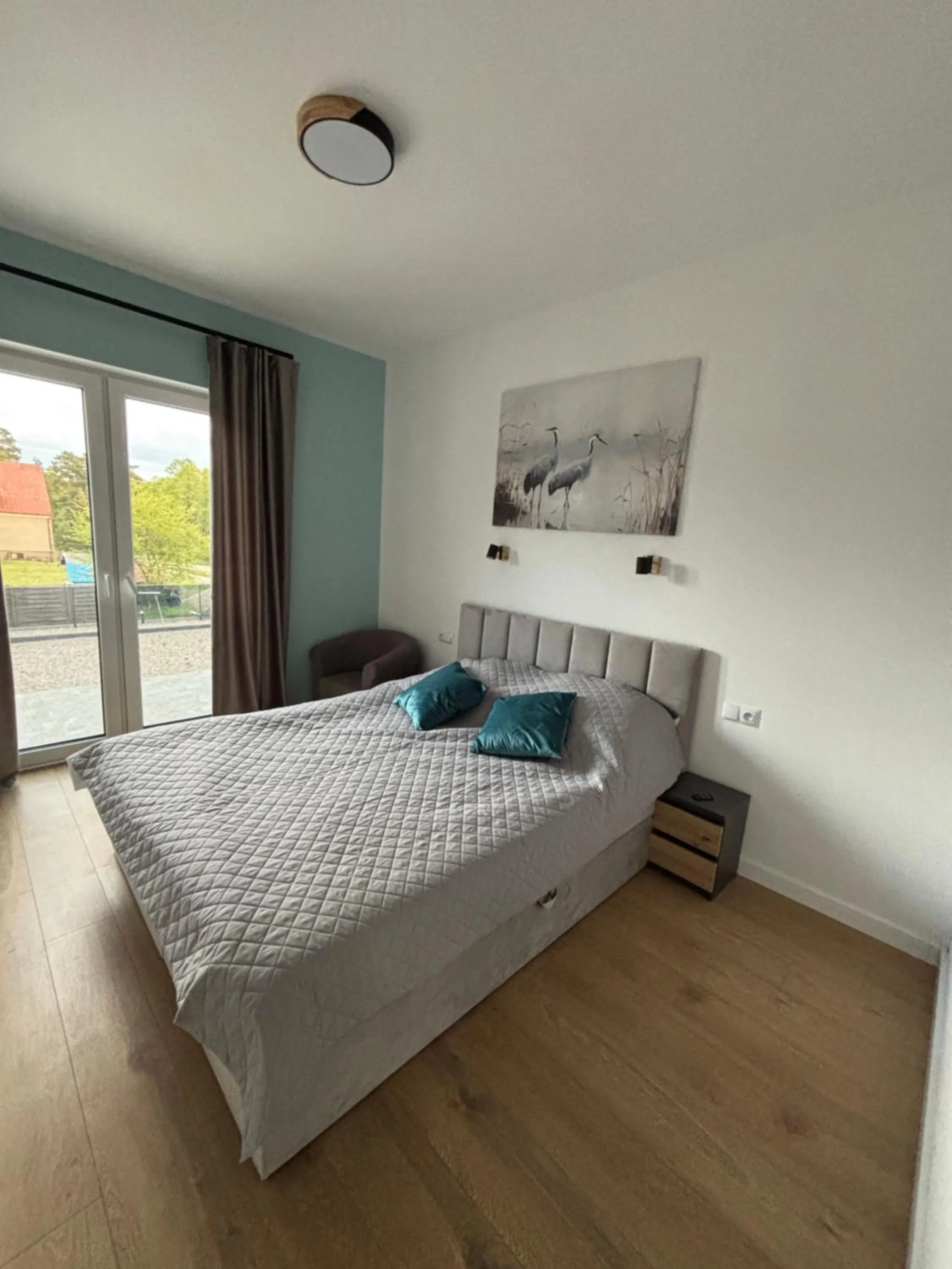 Bed in Flauta Apartamenty Augustów nad Jeziorem Białym
