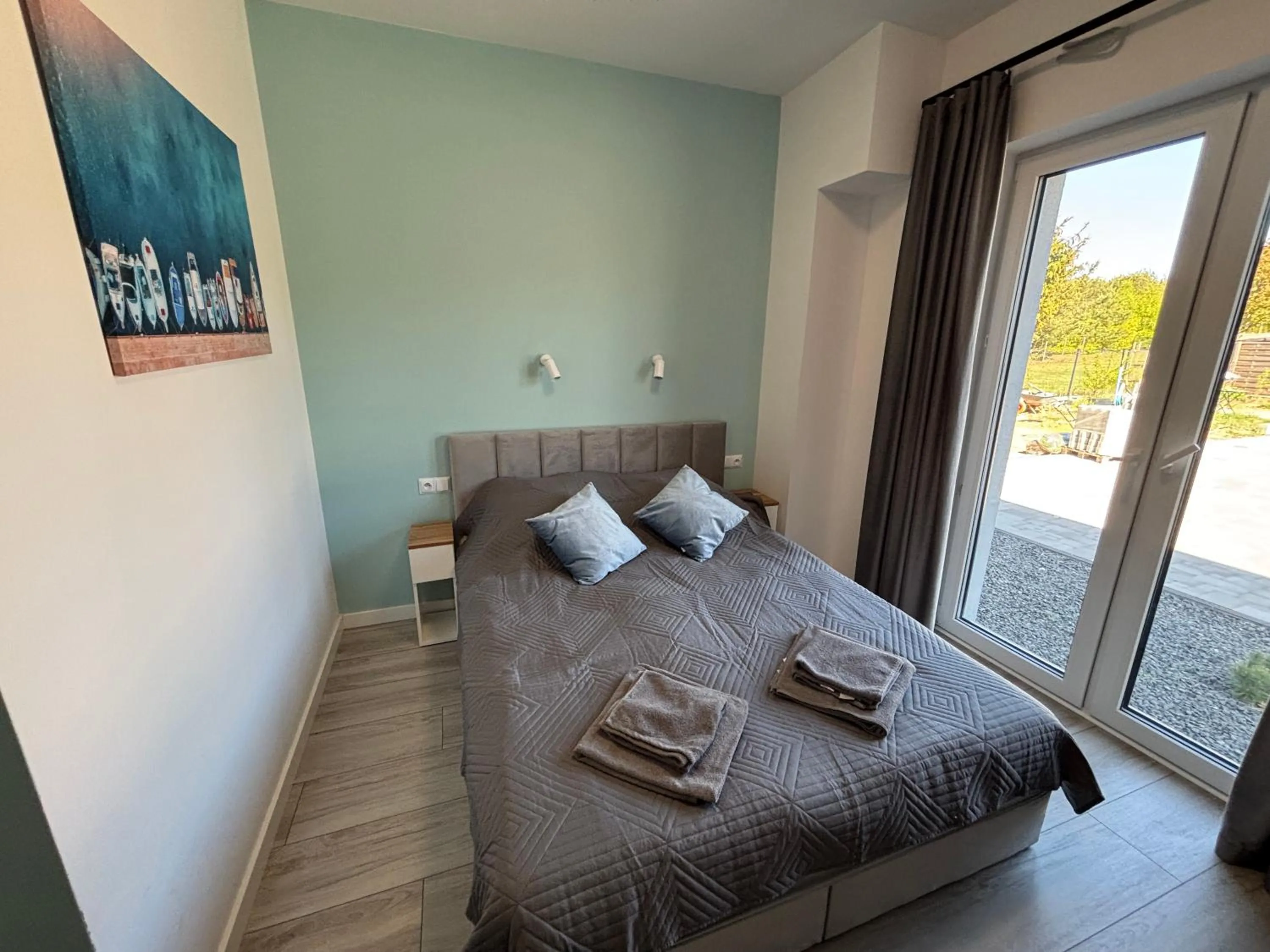 Bed in Flauta Apartamenty Augustów nad Jeziorem Białym
