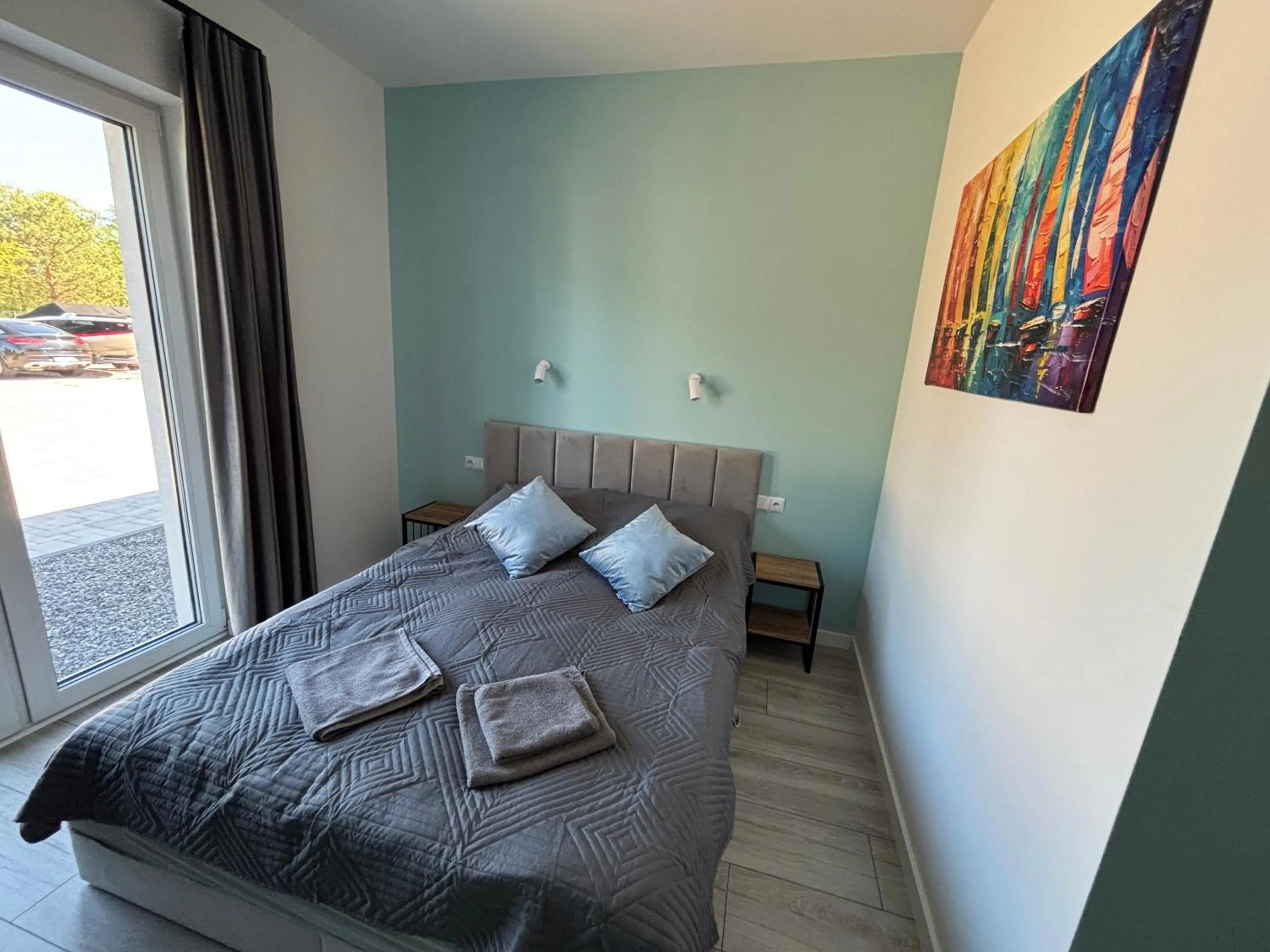 Bed in Flauta Apartamenty Augustów nad Jeziorem Białym
