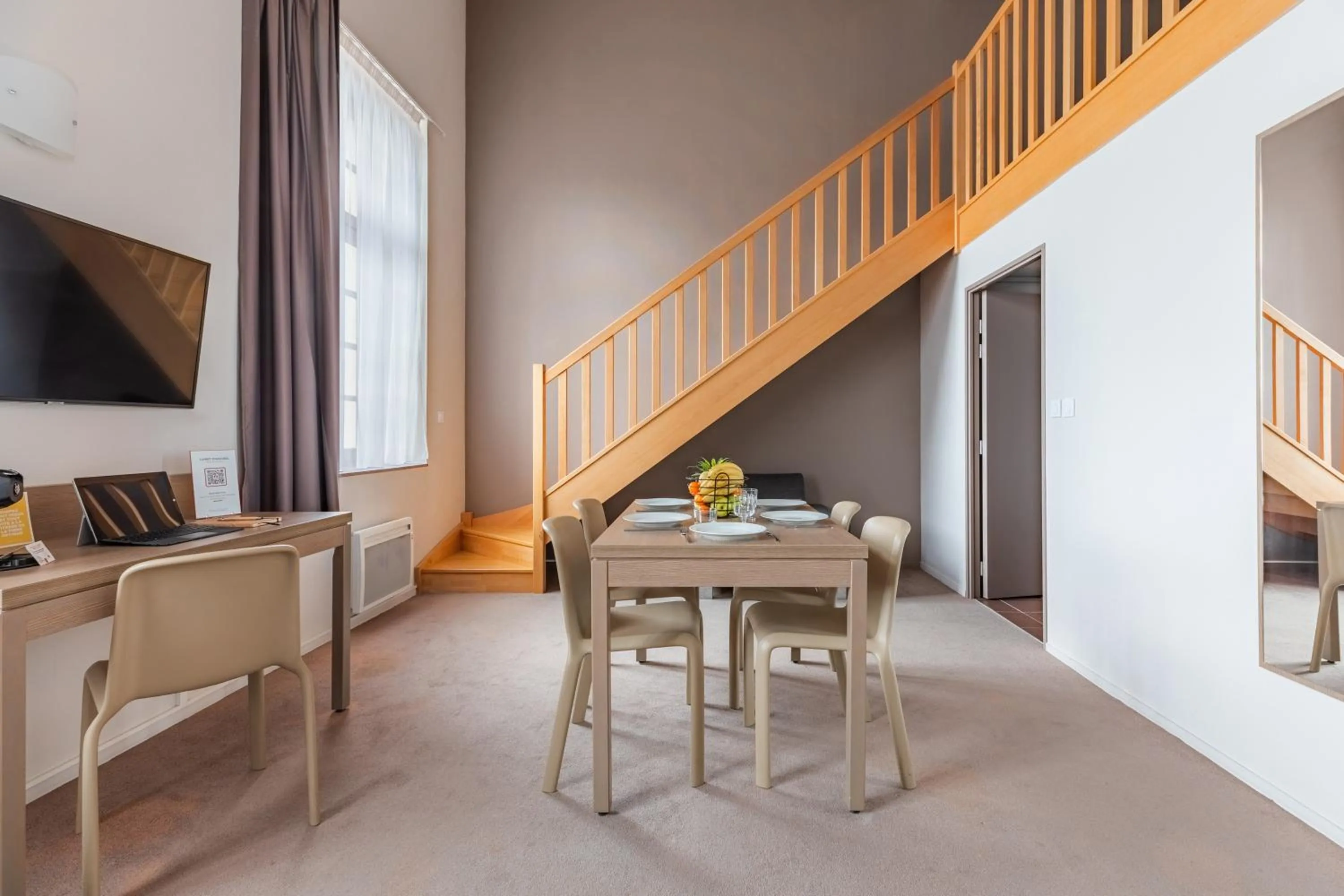 Living room in Appart’City Confort Reims Centre