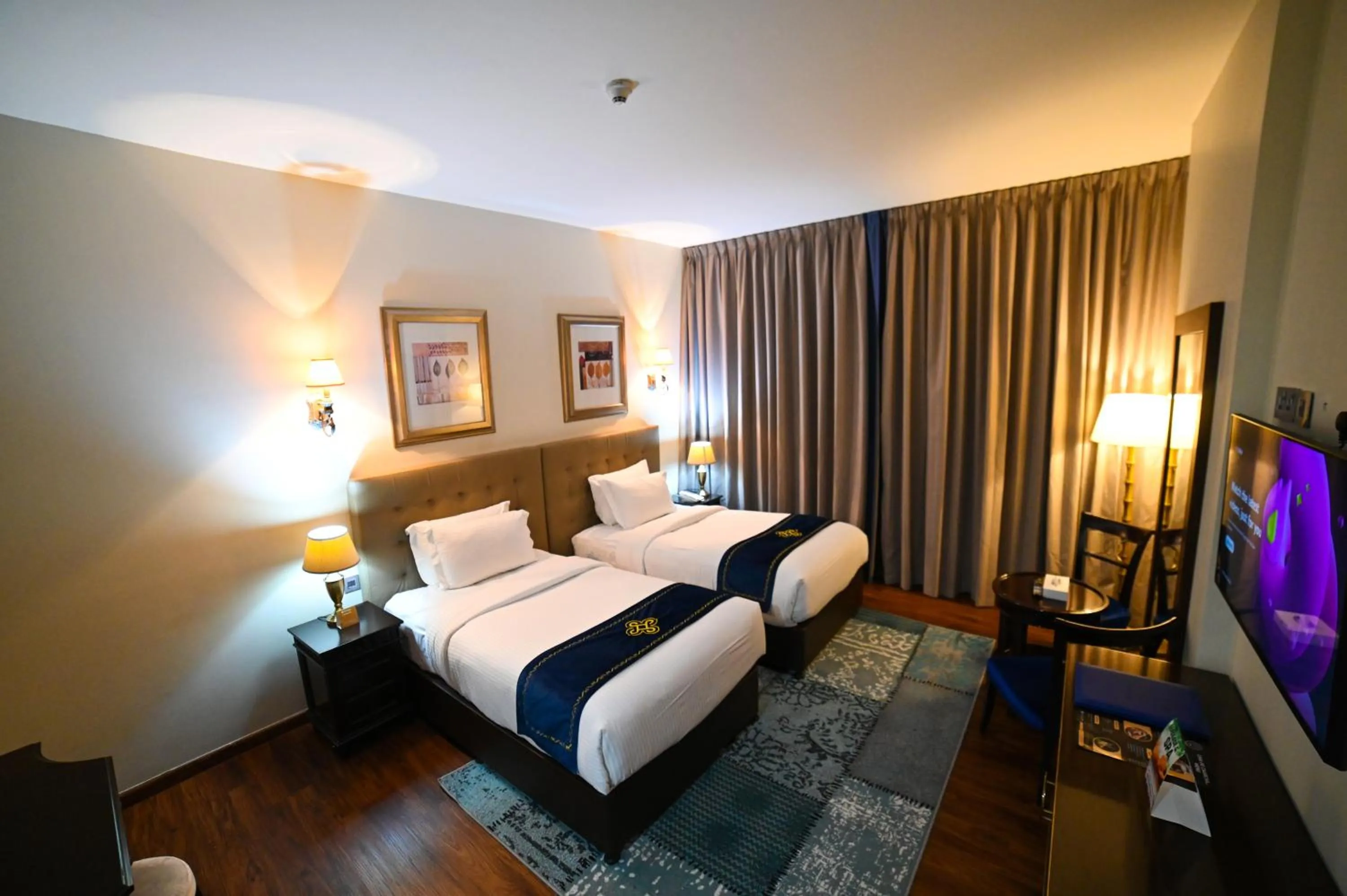 Bed in Seven Seas Hotel