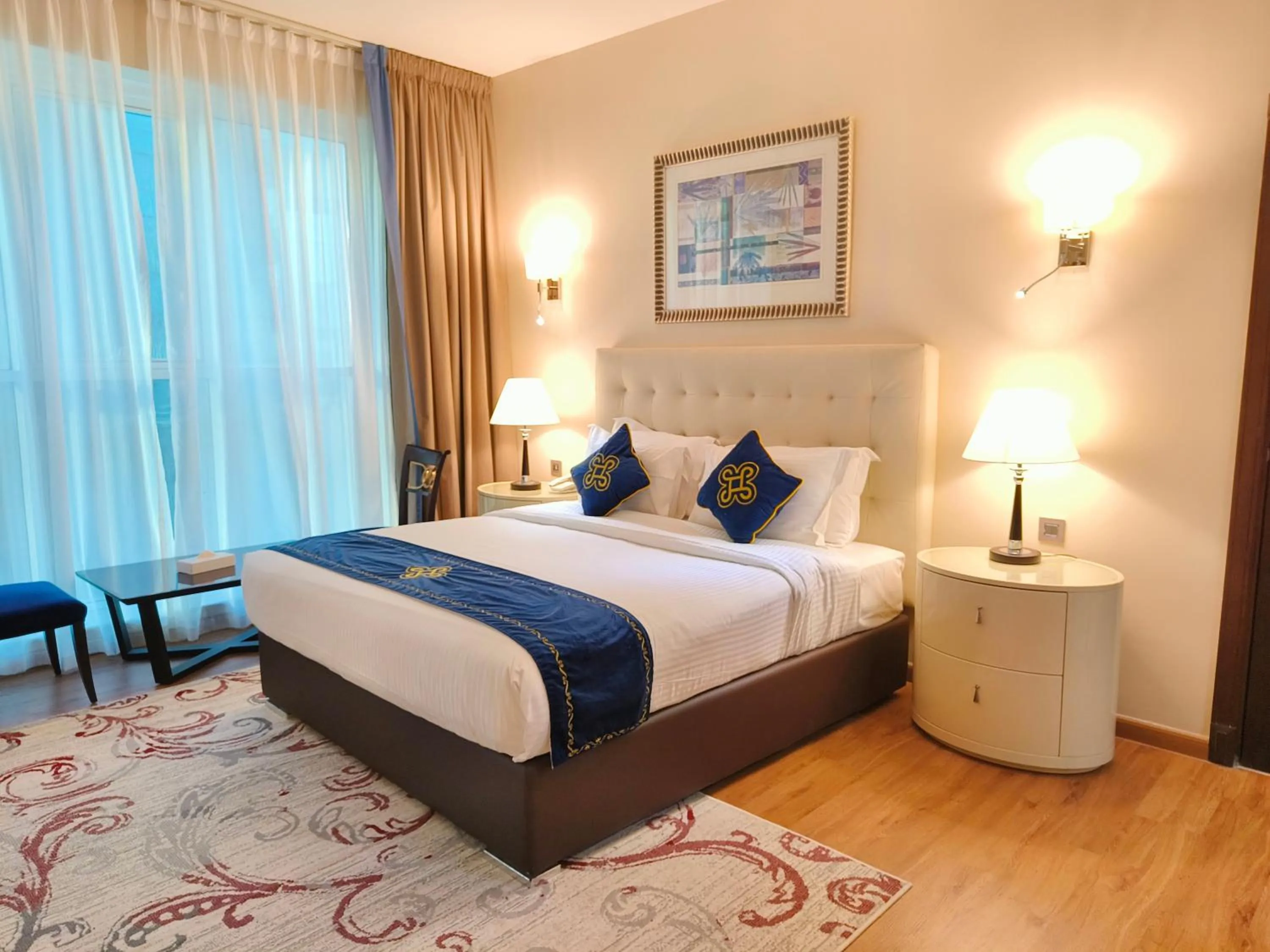 Bed in Seven Seas Hotel