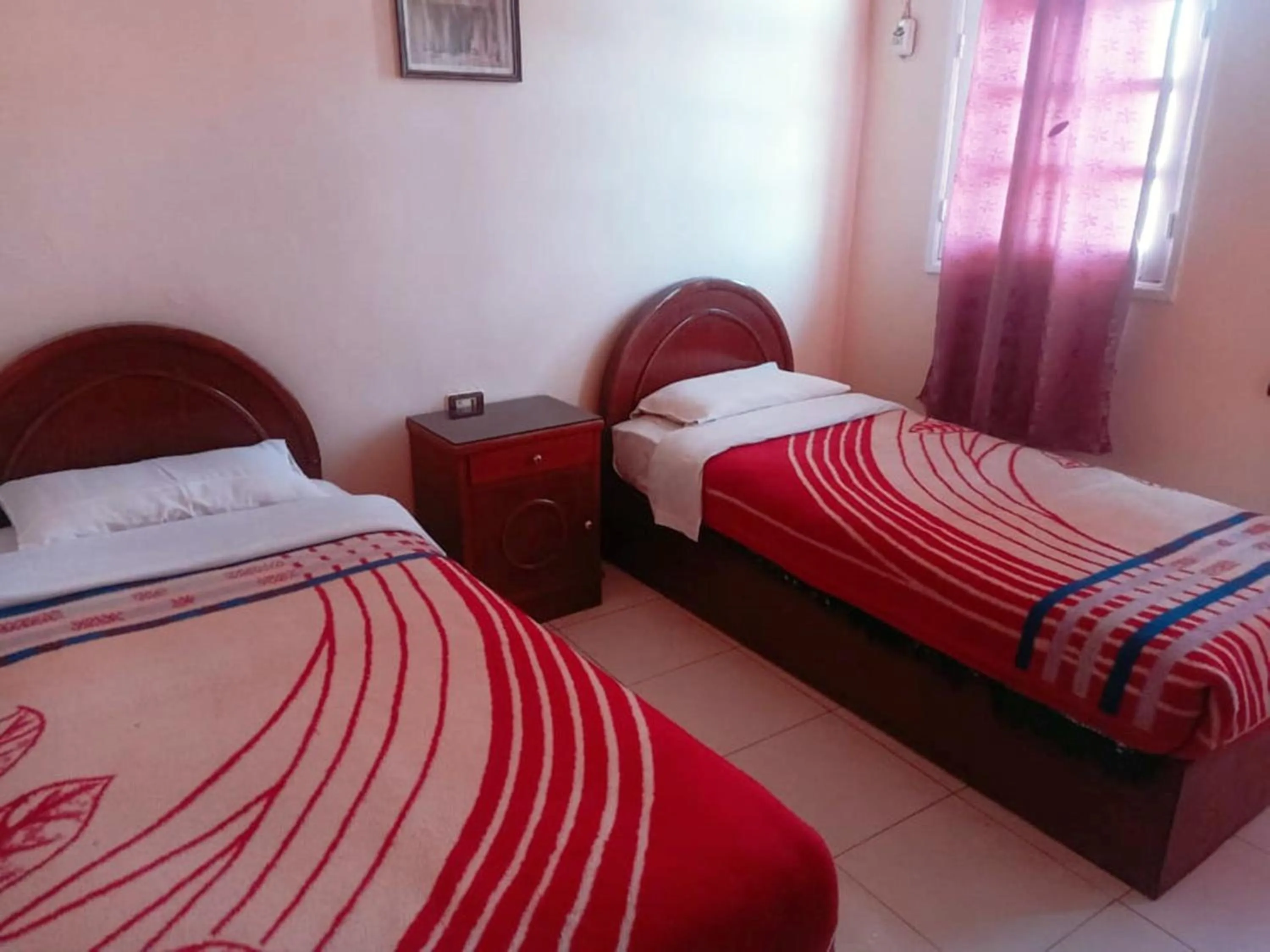 Bed in Amenophis Hotel