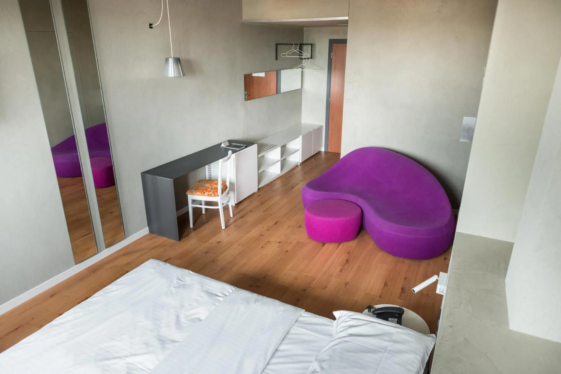 Seating area, Bed in Point Hotel