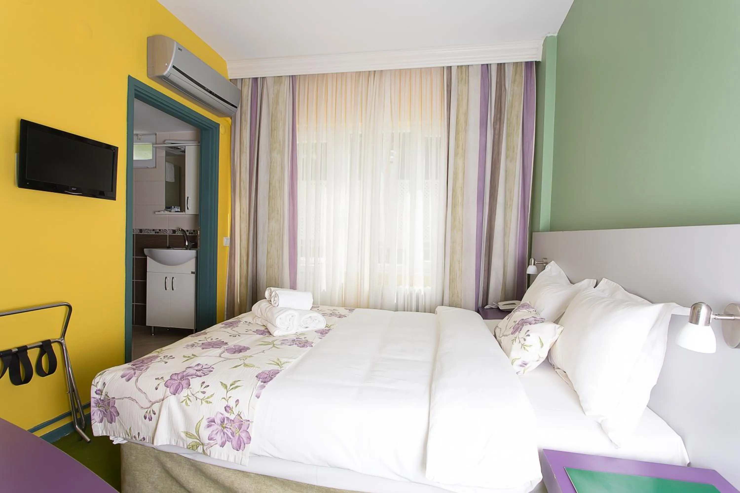 Bed in Mini Harem Hotel