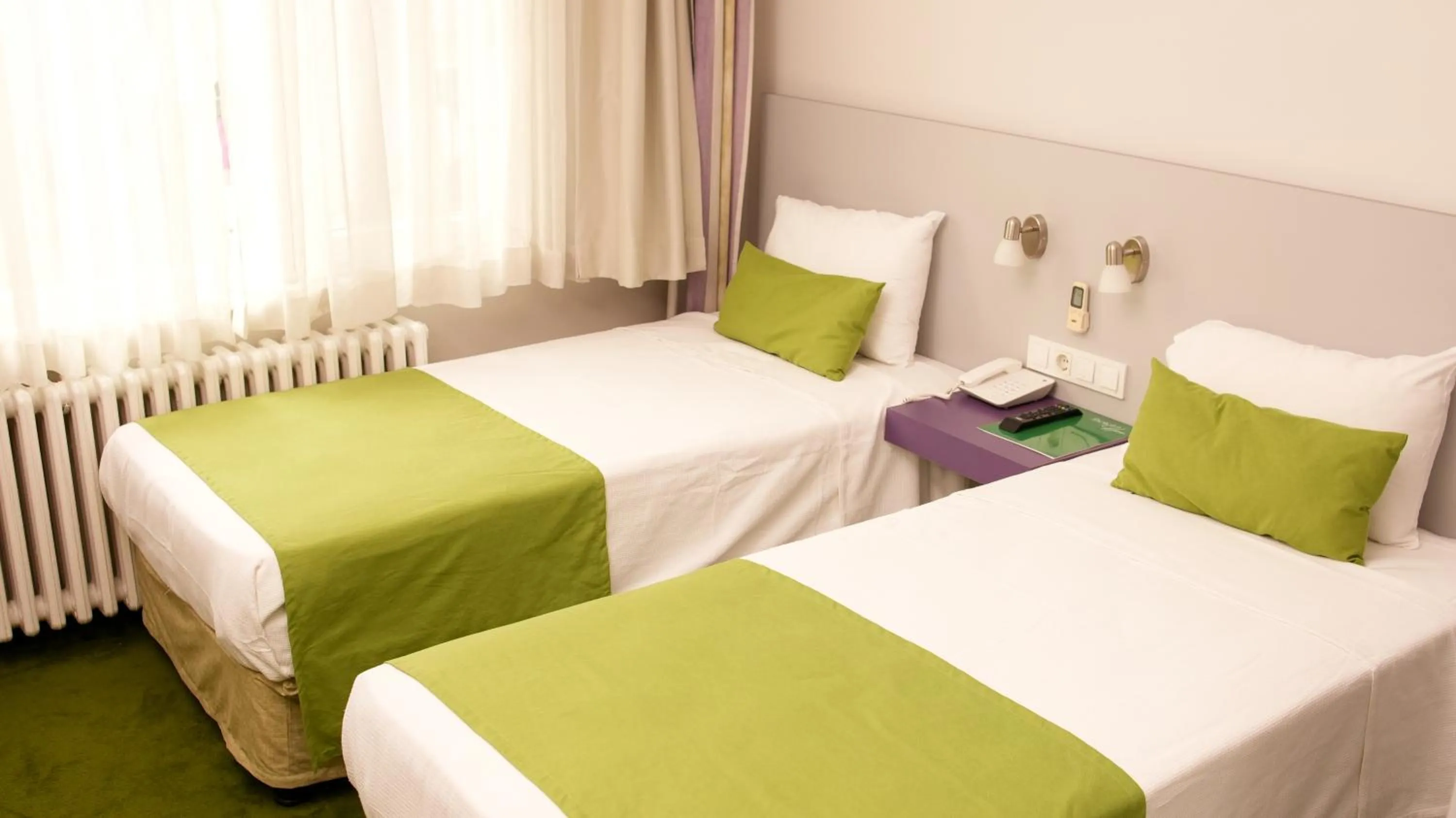 Bed in Mini Harem Hotel