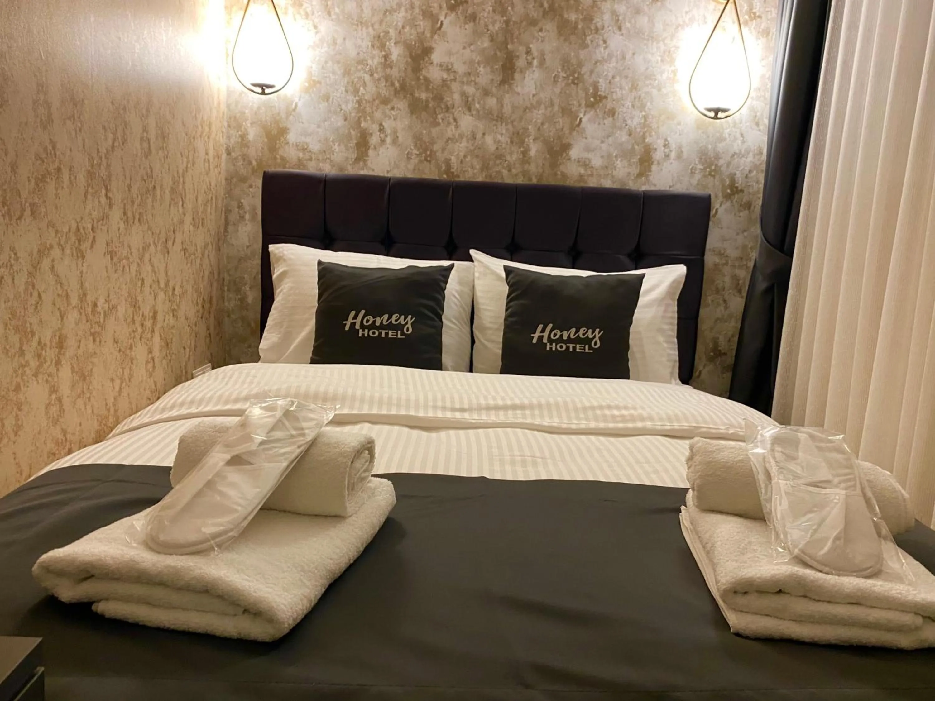 Bed in Honey Hotel