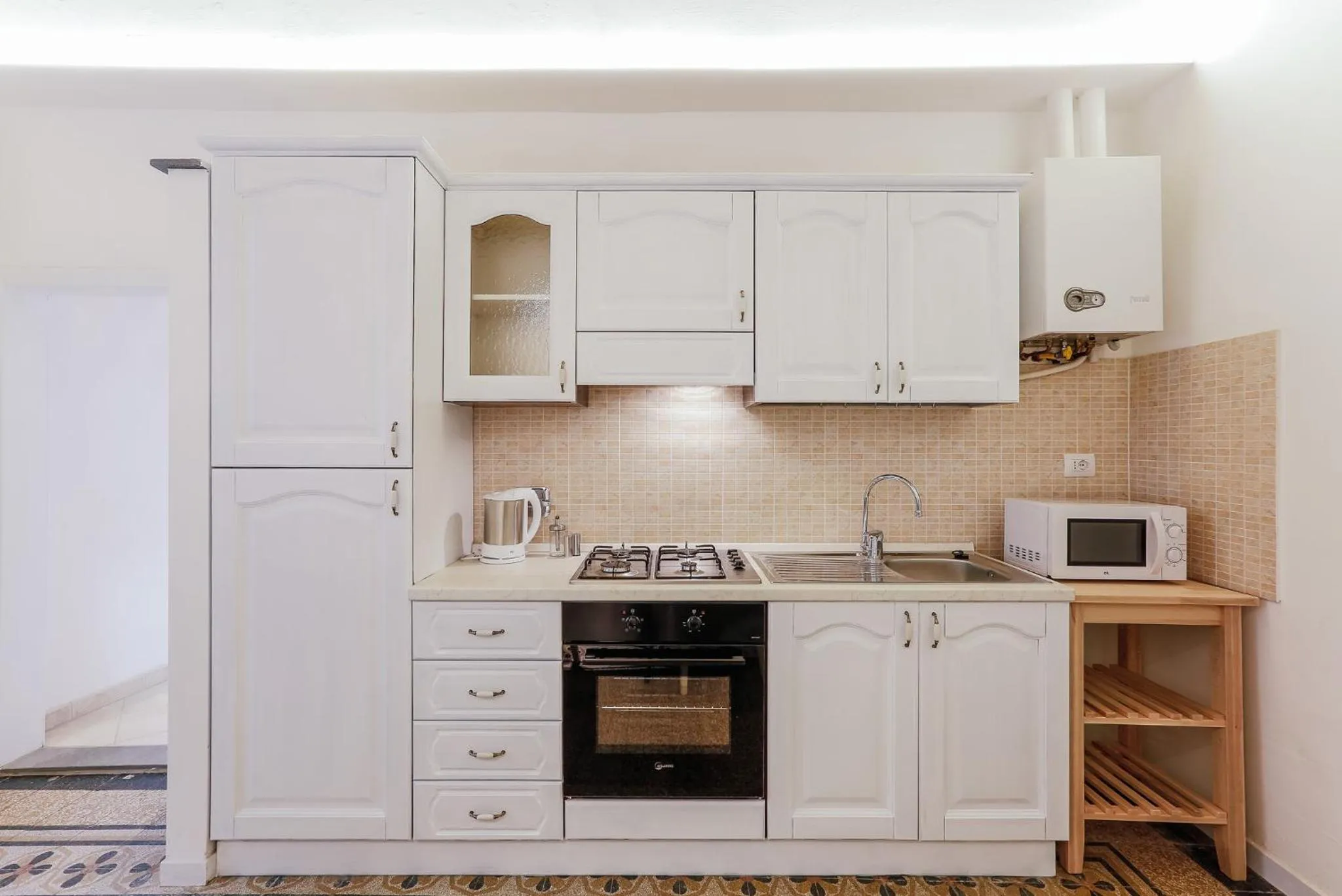 Kitchen or kitchenette in Locanda dei Poeti Rooms & Apartments