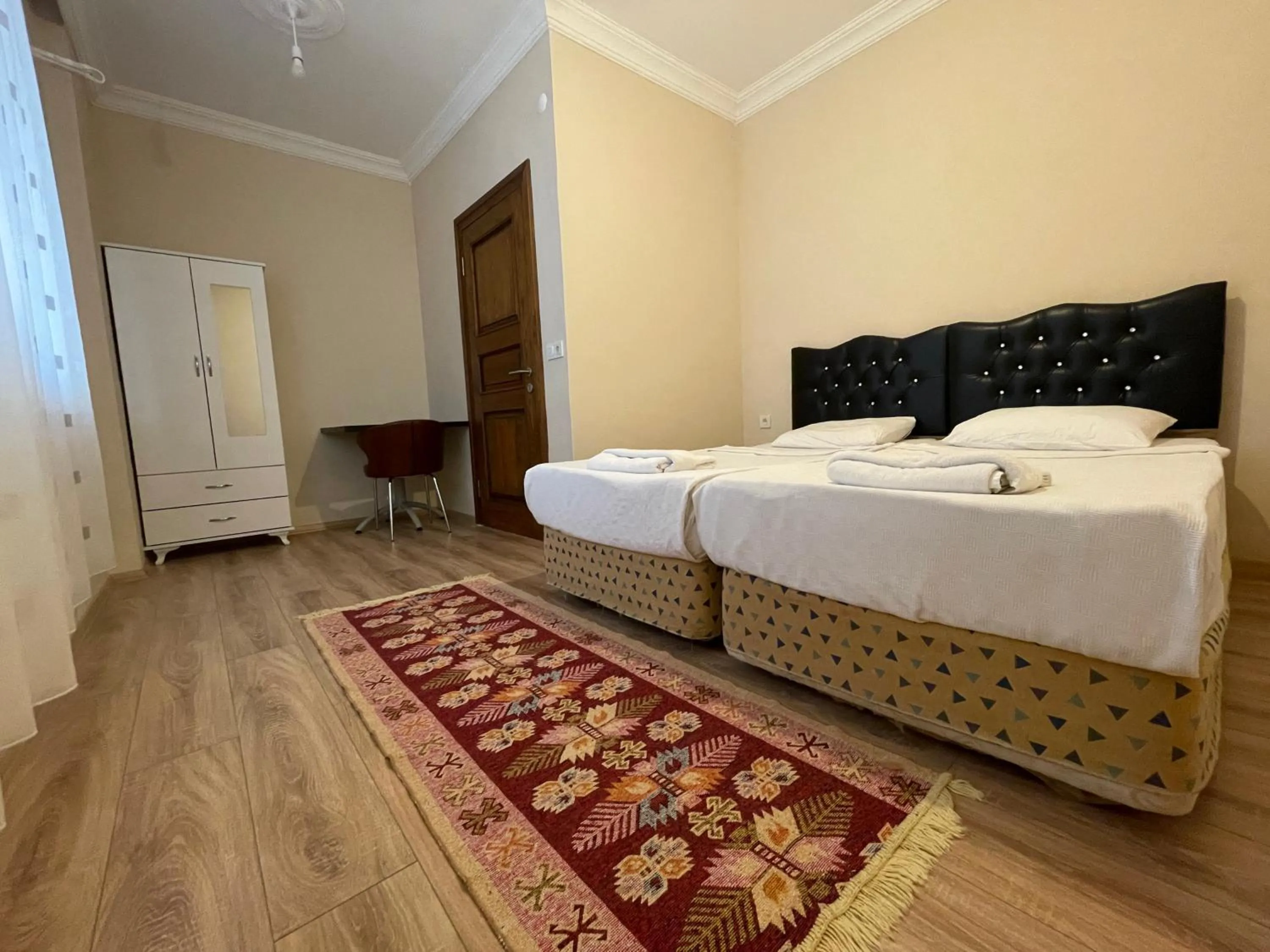 Bed in Select Suite & Apart Hotel