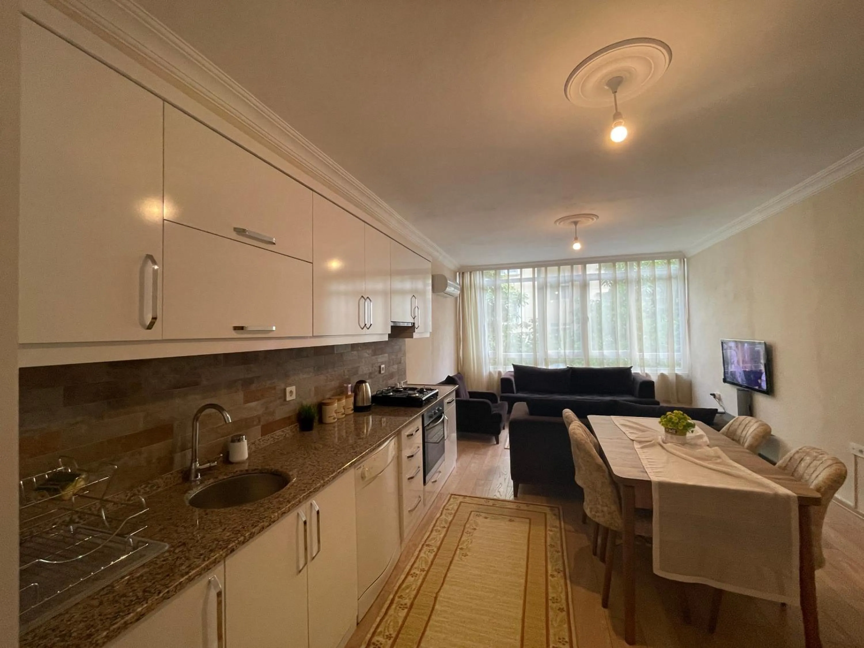 Kitchen or kitchenette in Select Suite & Apart Hotel