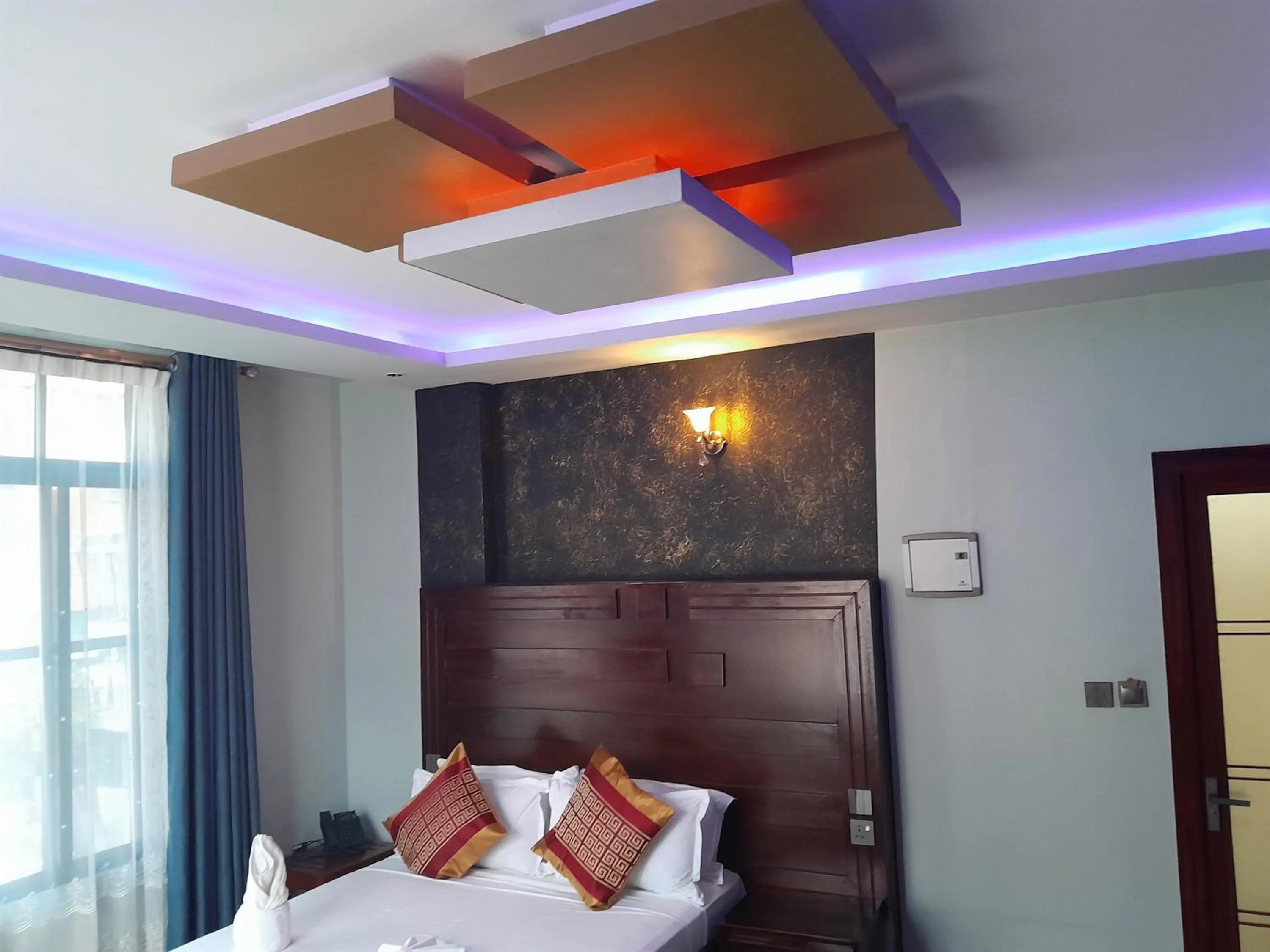 Bed in Mazola Diamond Hotel