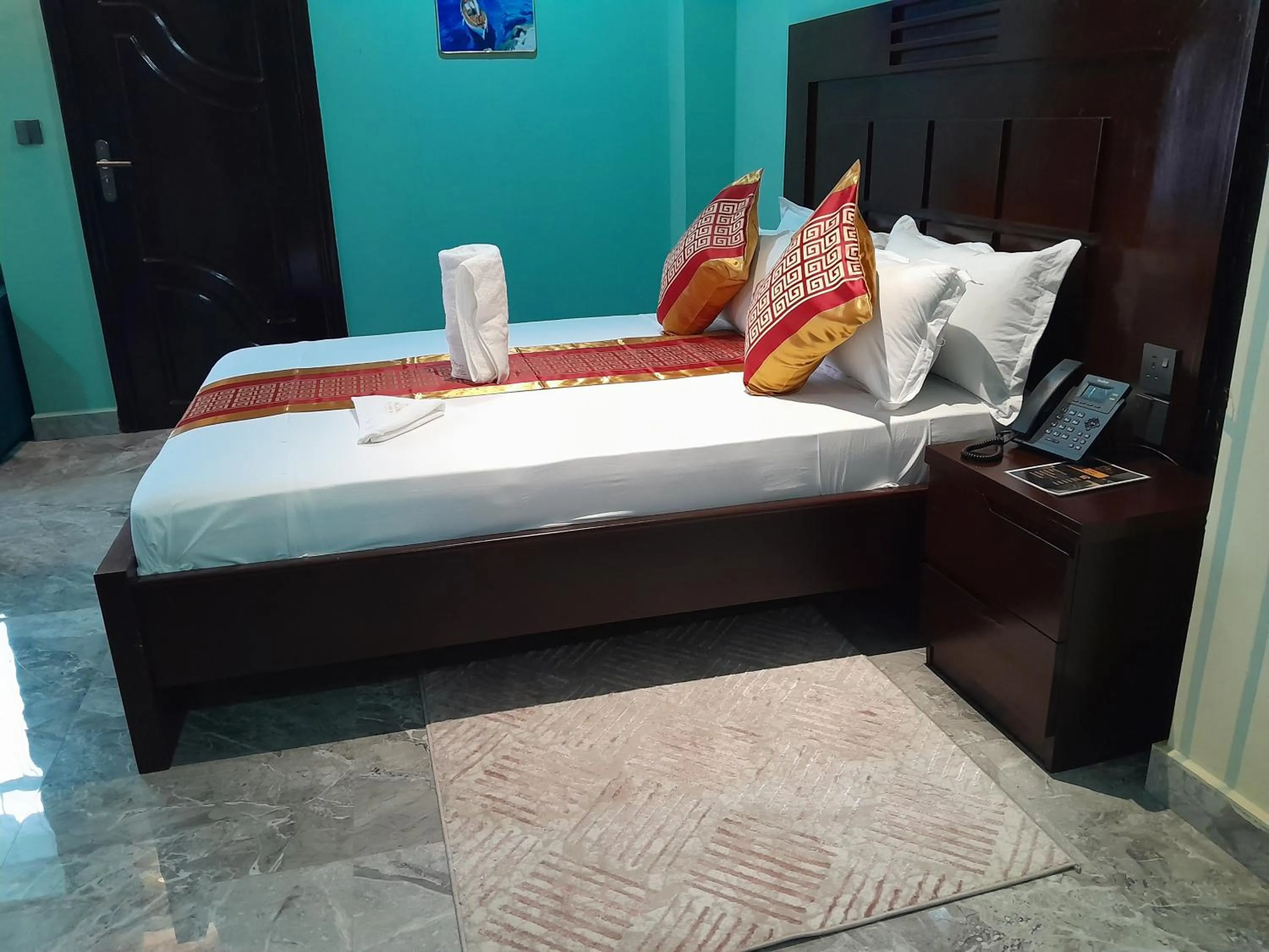 Bed in Mazola Diamond Hotel