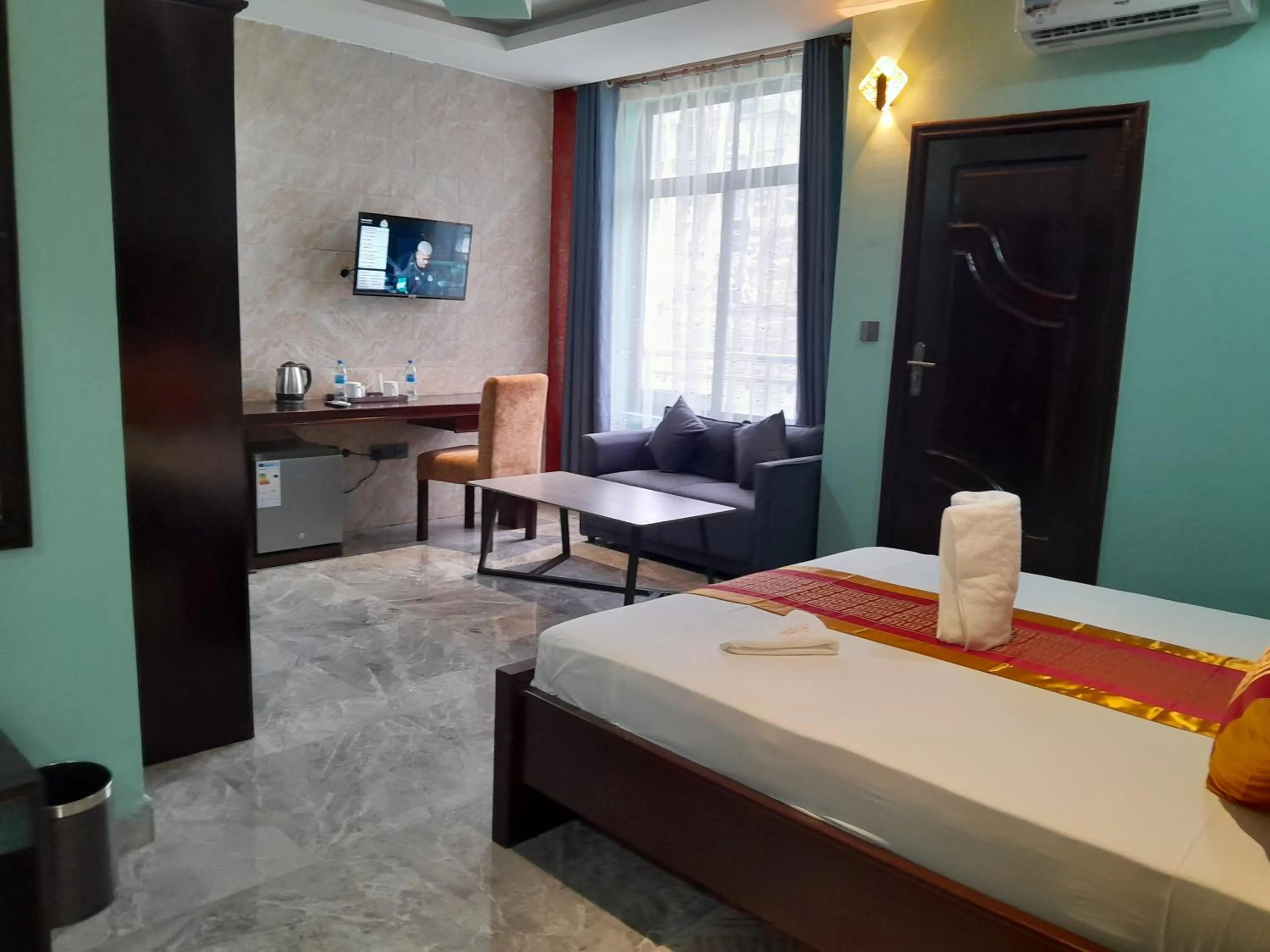 Bed in Mazola Diamond Hotel