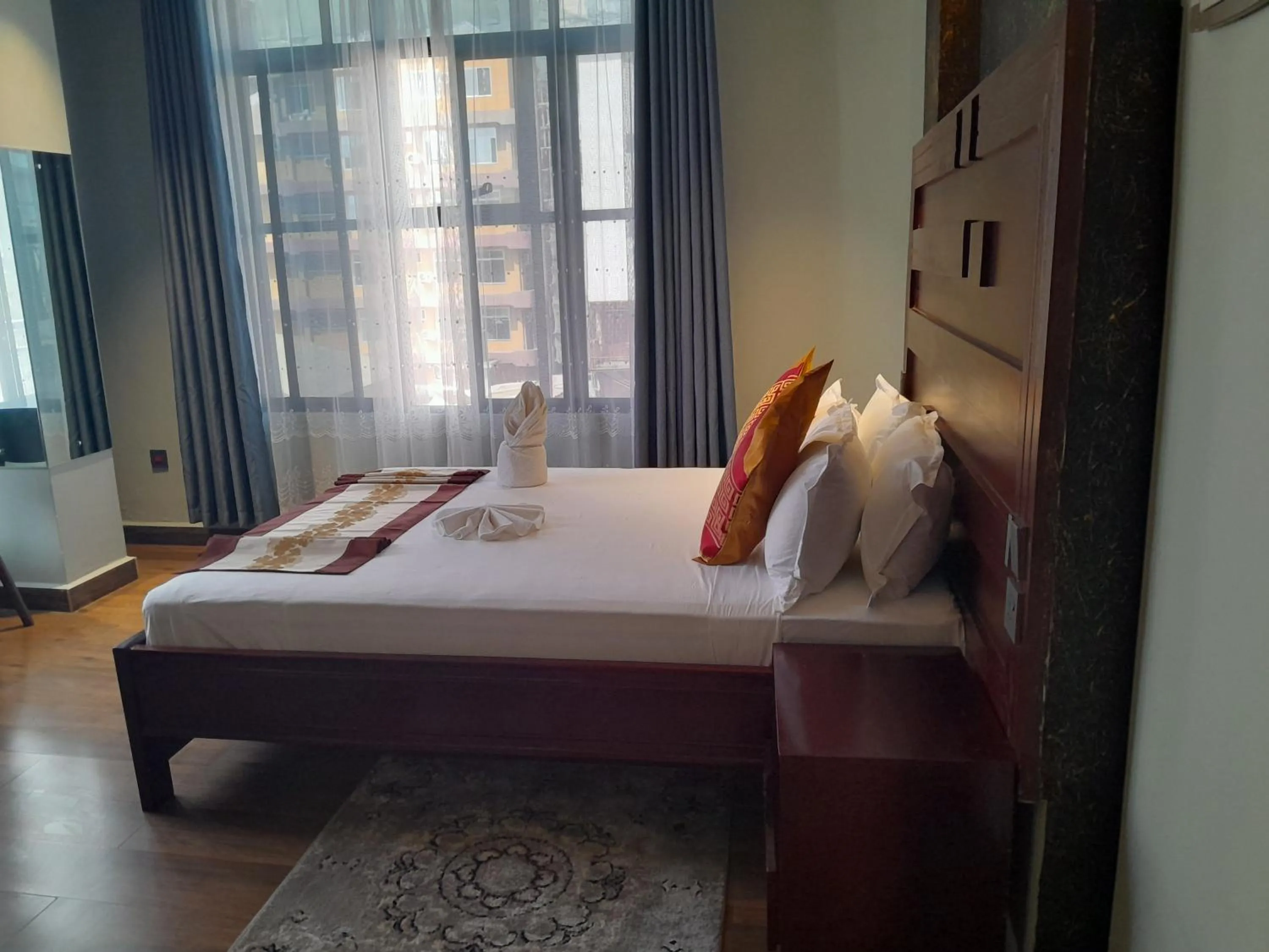 Bed in Mazola Diamond Hotel