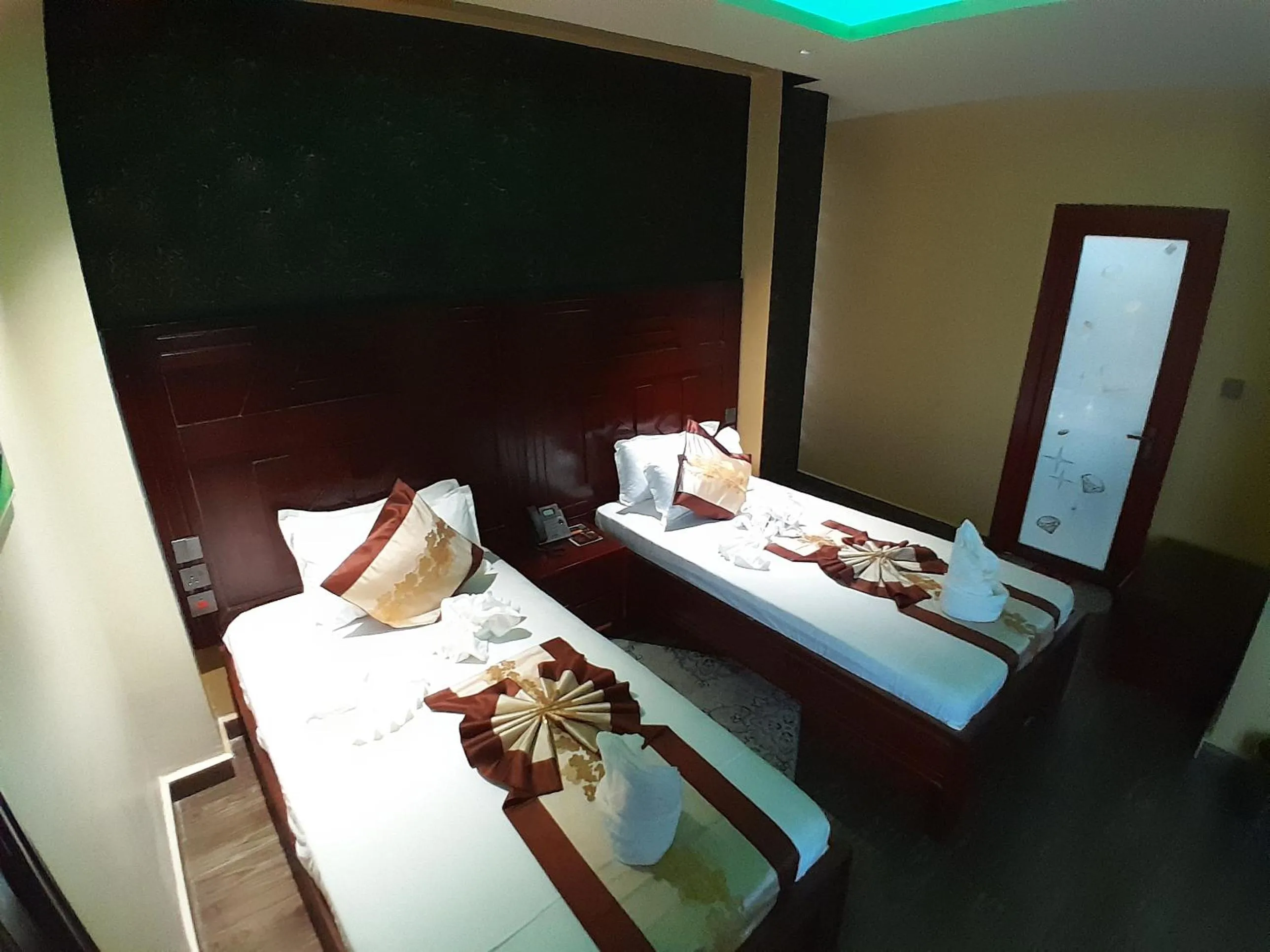 Bed in Mazola Diamond Hotel