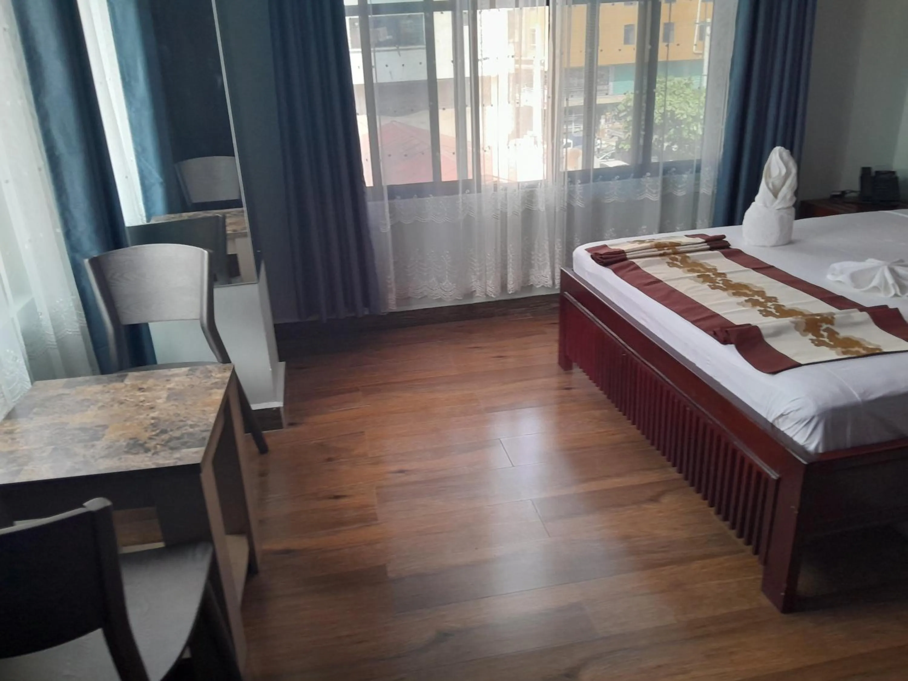 Bed in Mazola Diamond Hotel