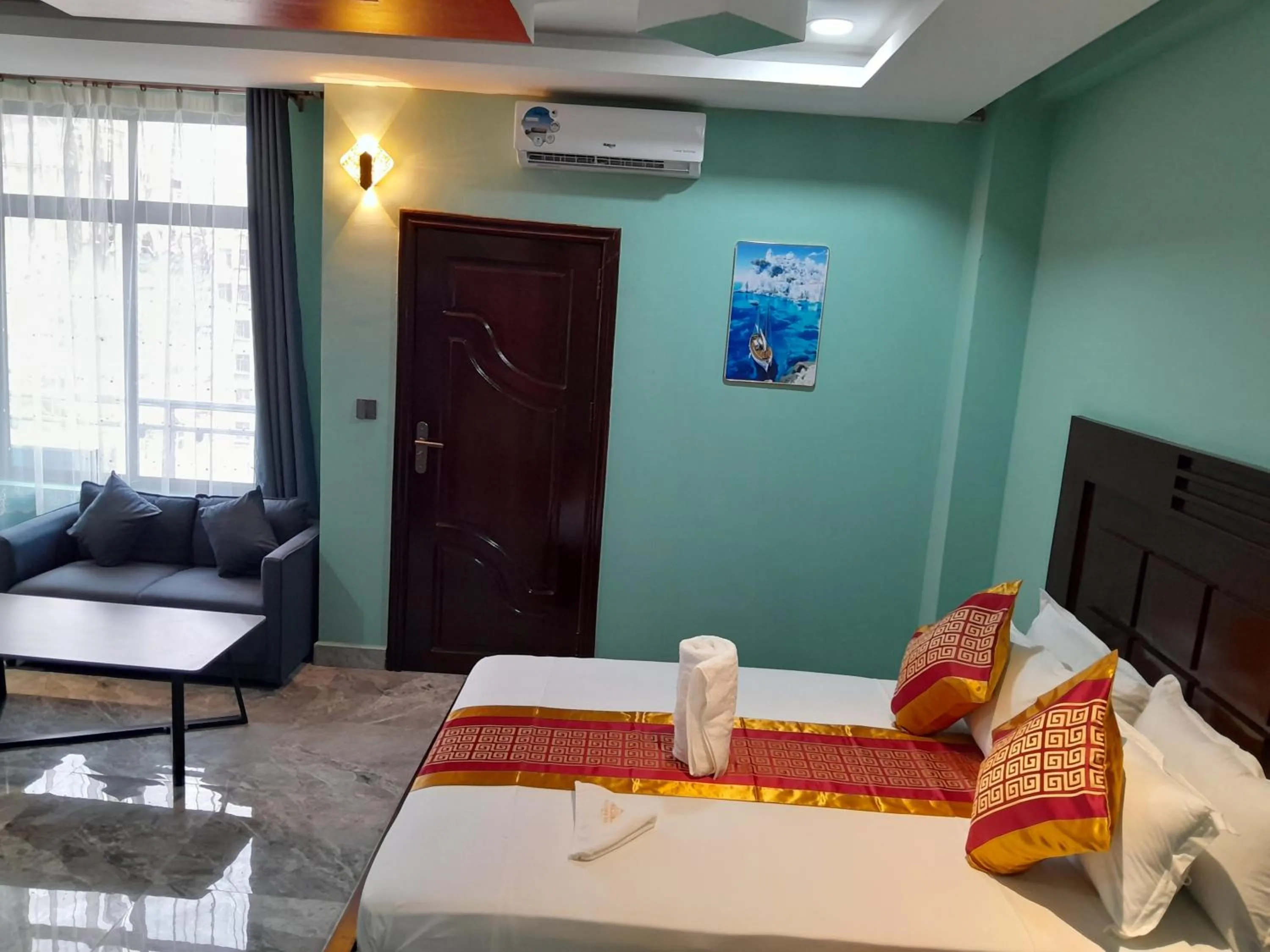 Bed in Mazola Diamond Hotel