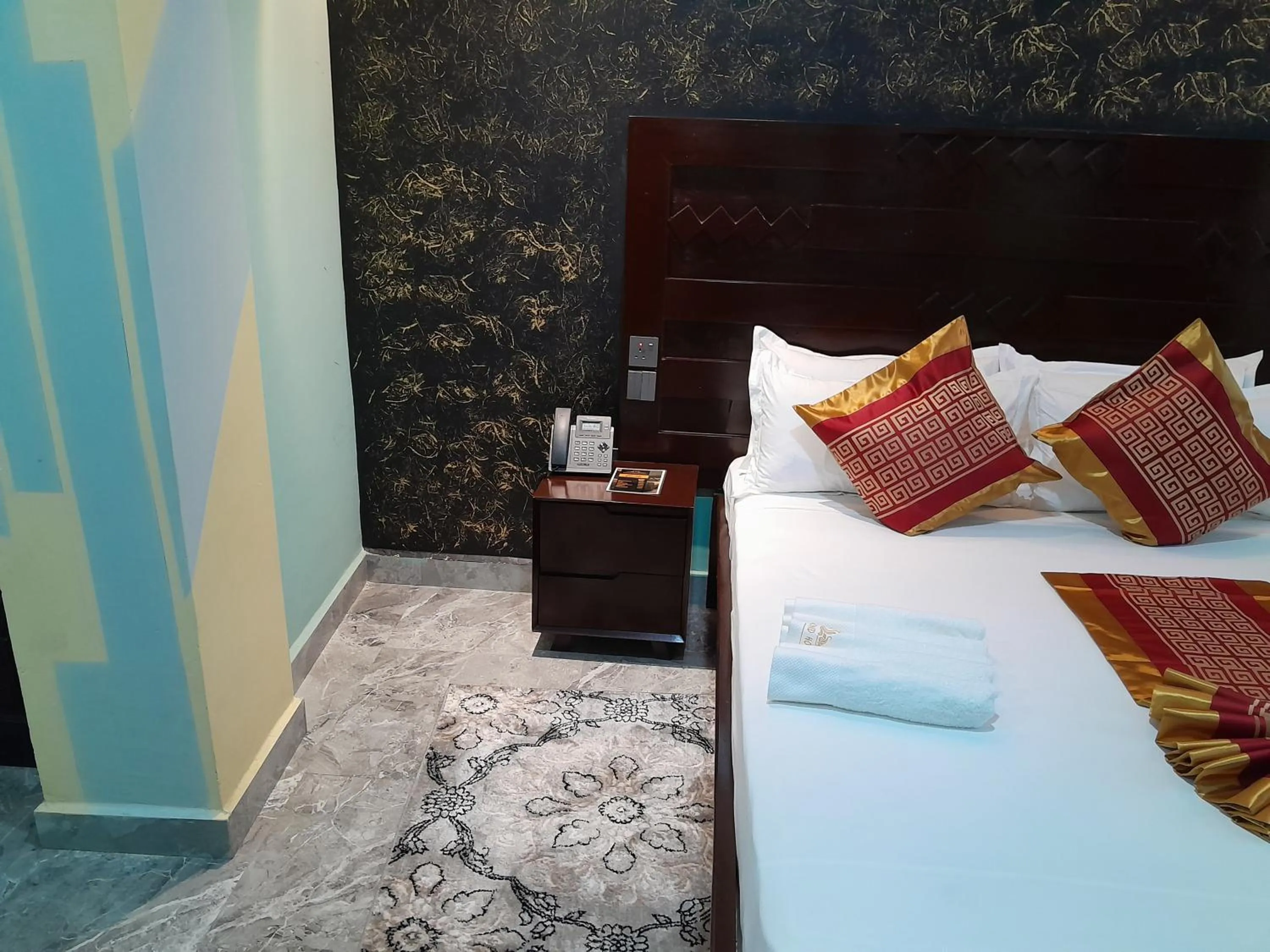 Bed in Mazola Diamond Hotel