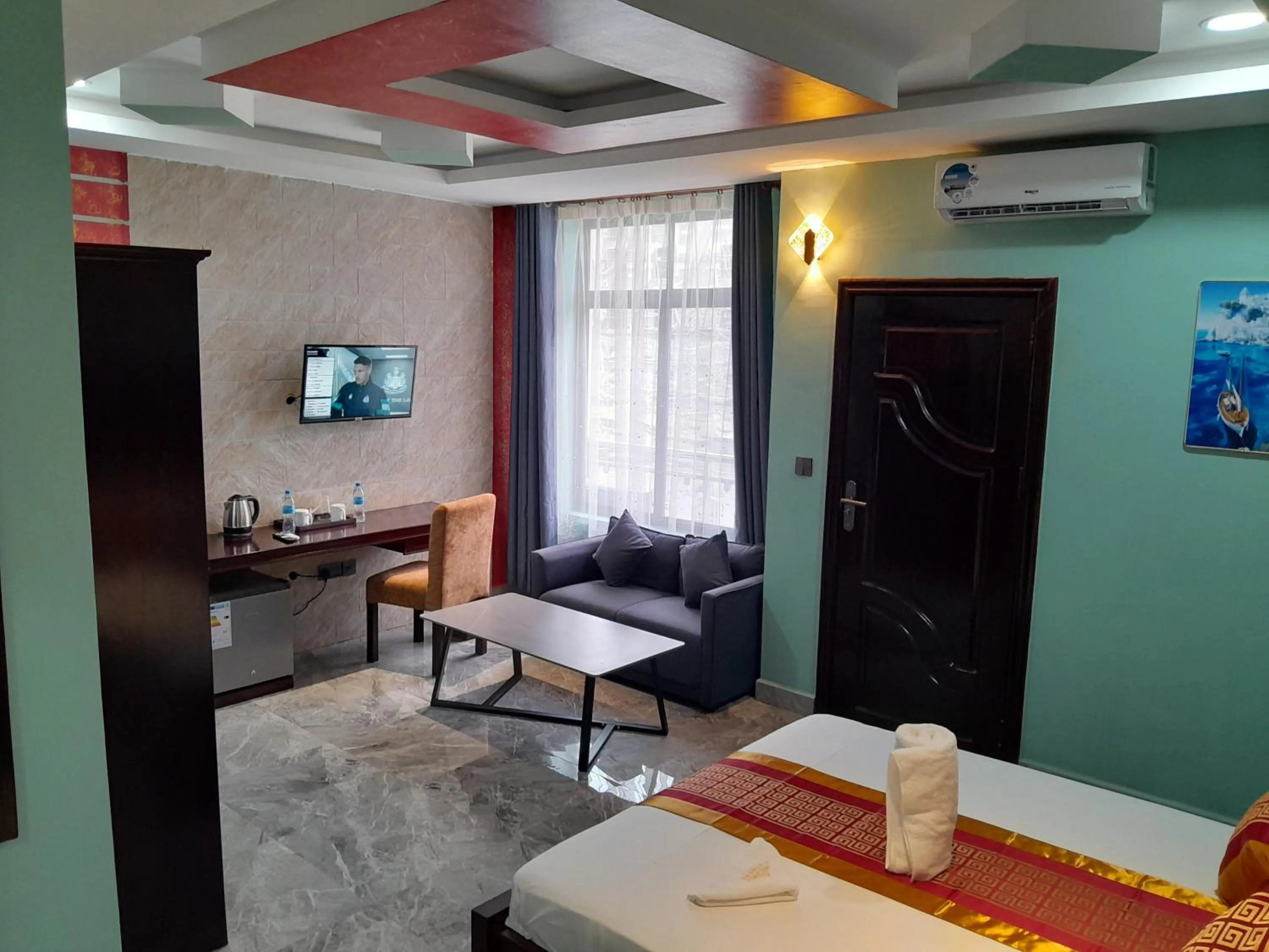 Bed in Mazola Diamond Hotel