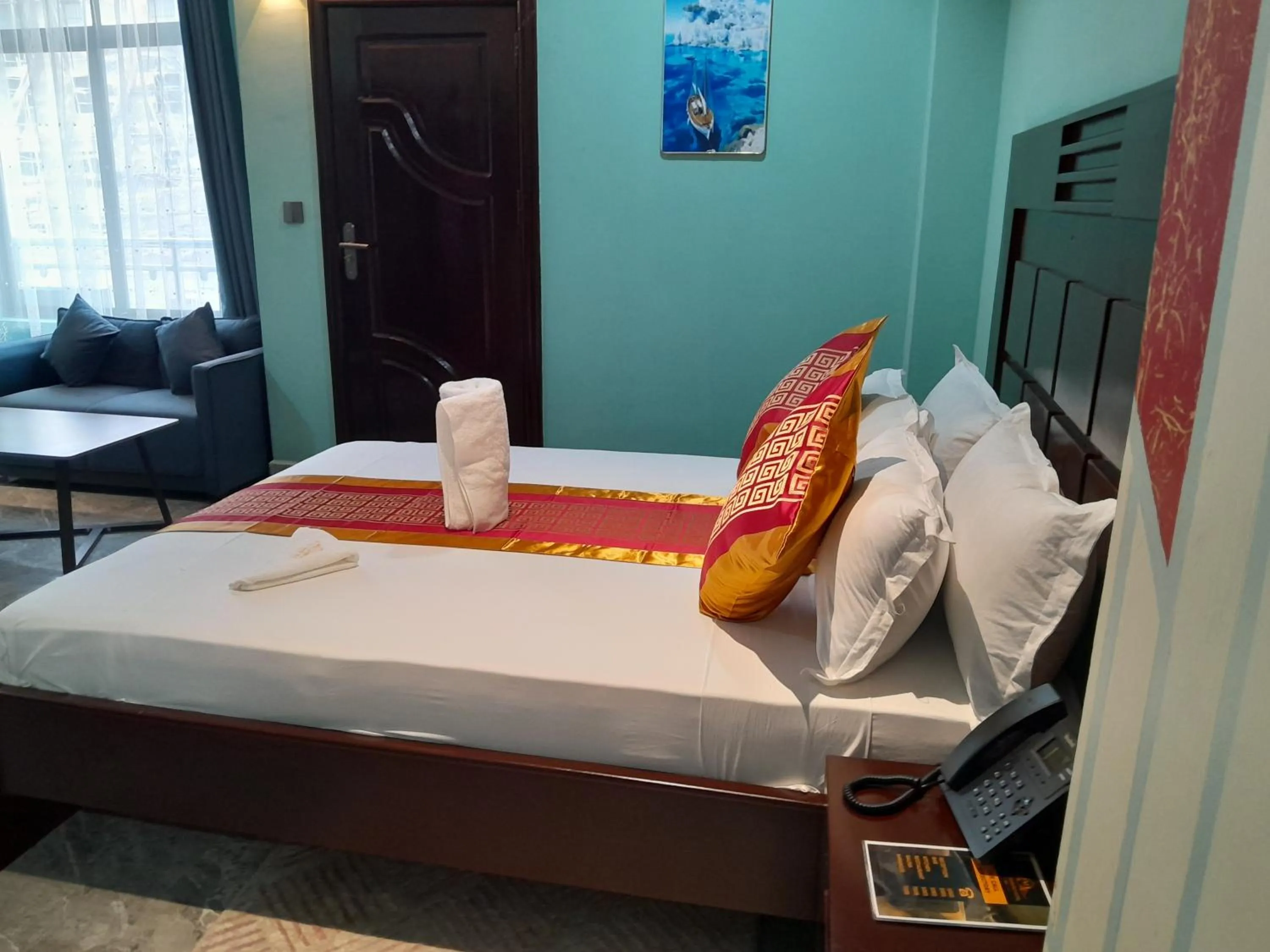 Bed in Mazola Diamond Hotel