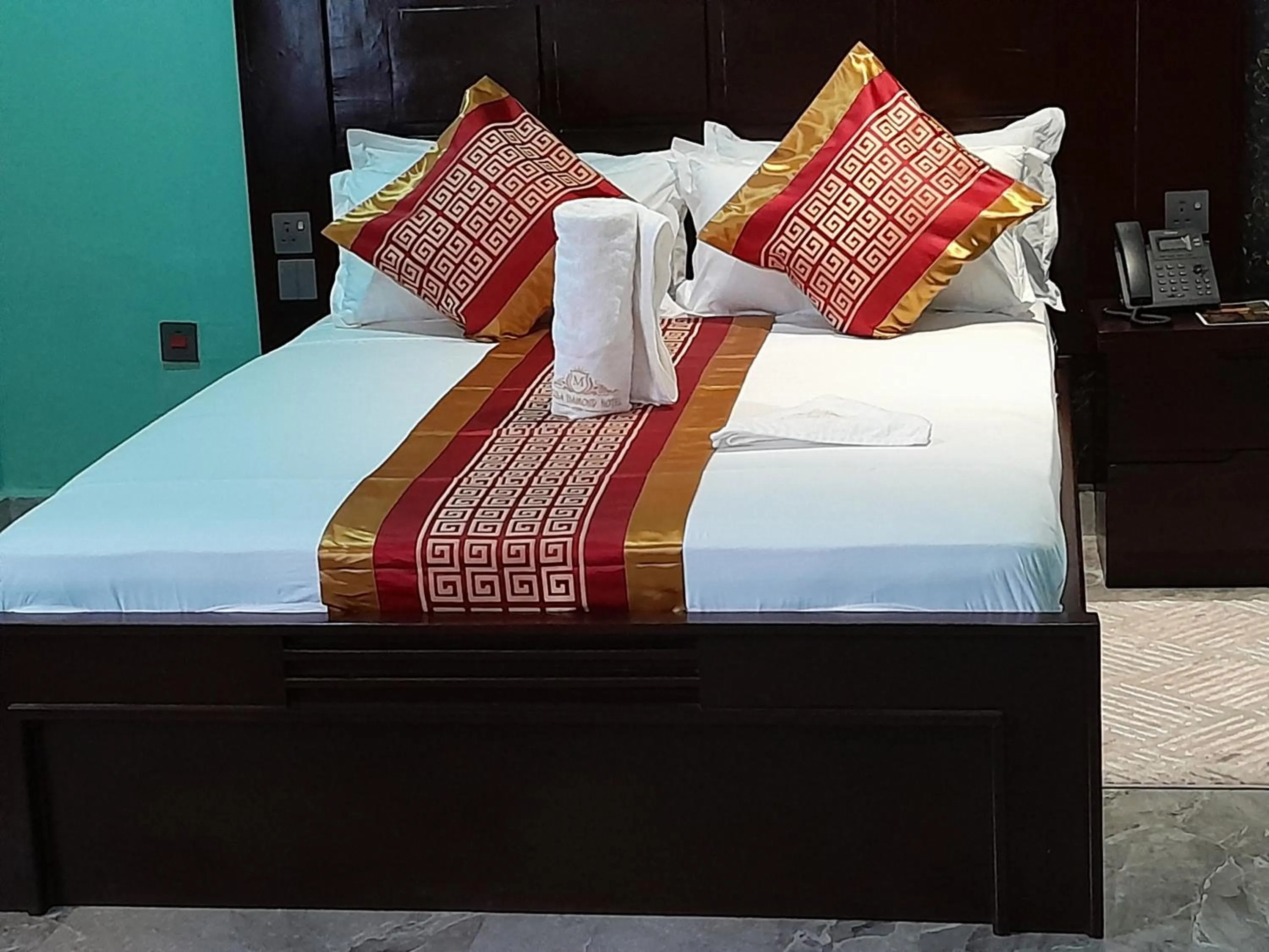 Bed in Mazola Diamond Hotel