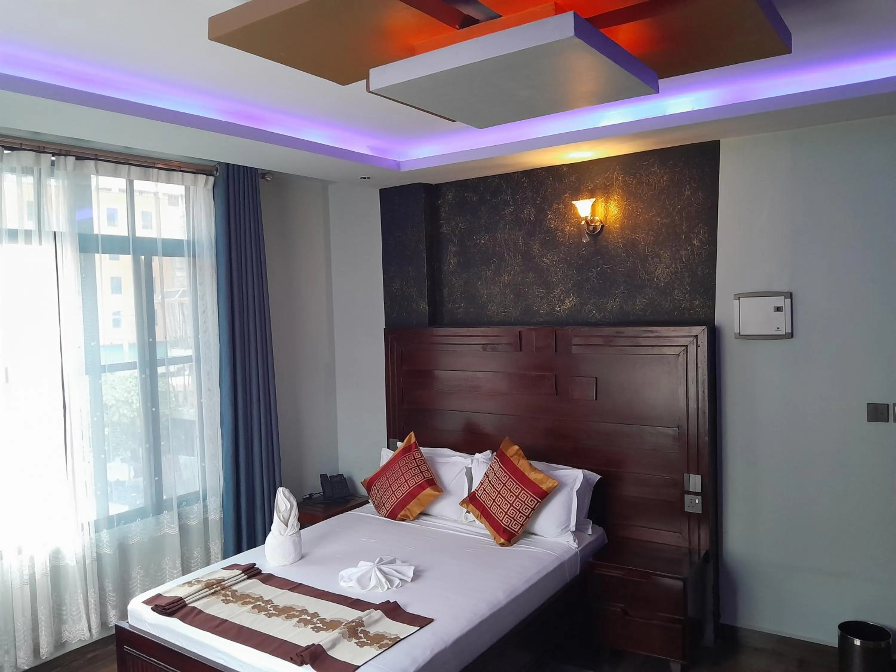 Bed in Mazola Diamond Hotel