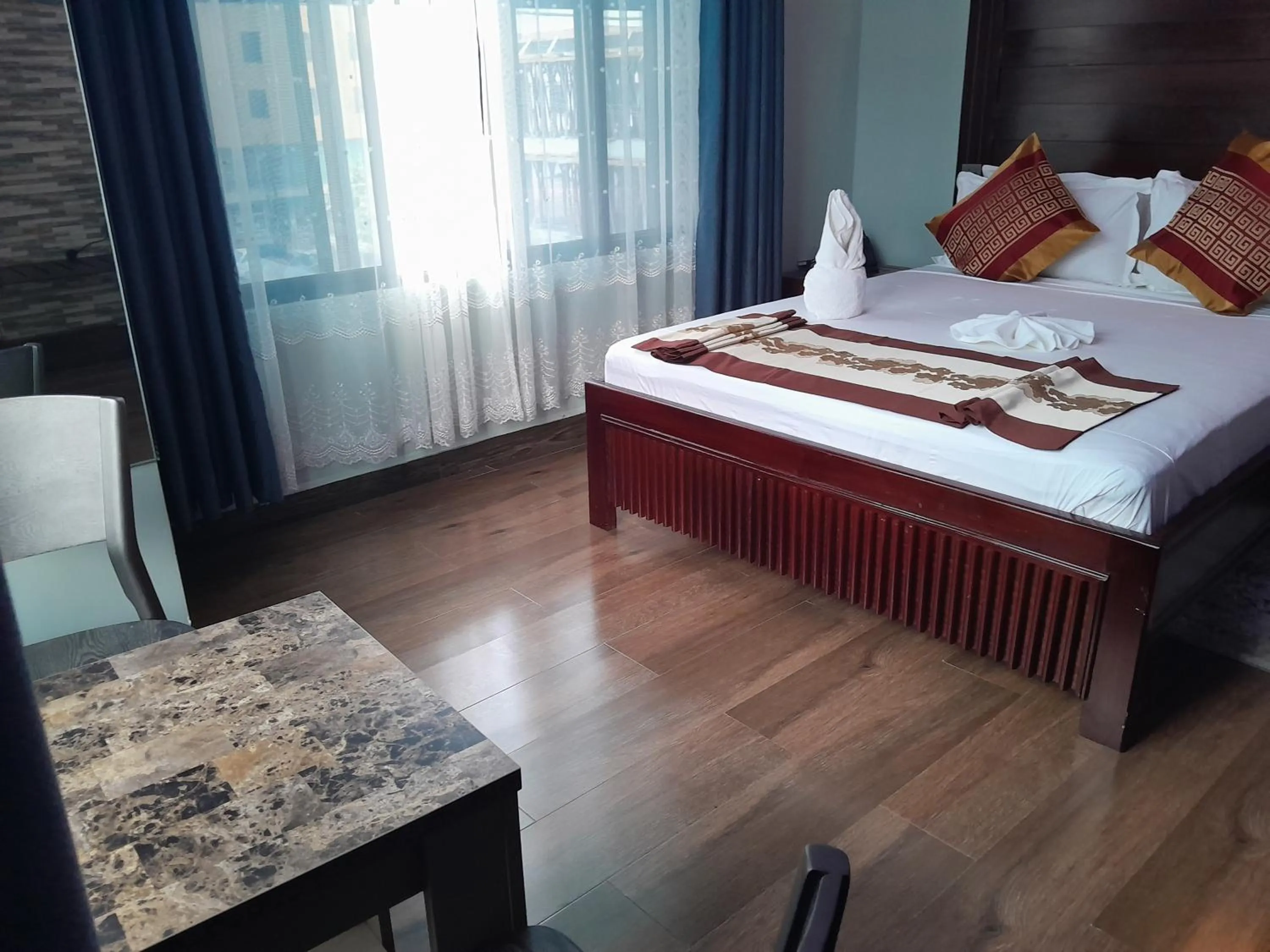 Bed in Mazola Diamond Hotel