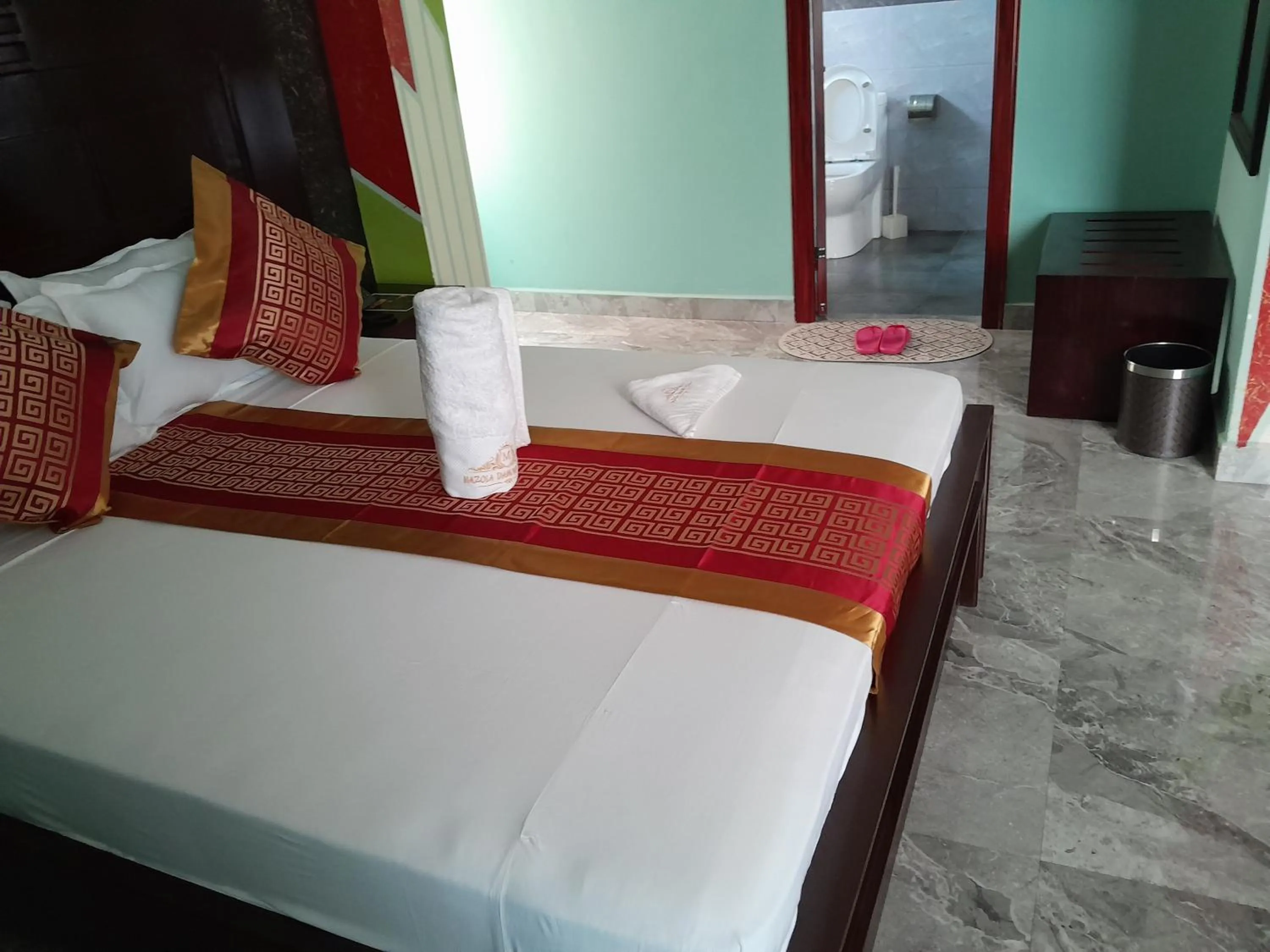 Bed in Mazola Diamond Hotel