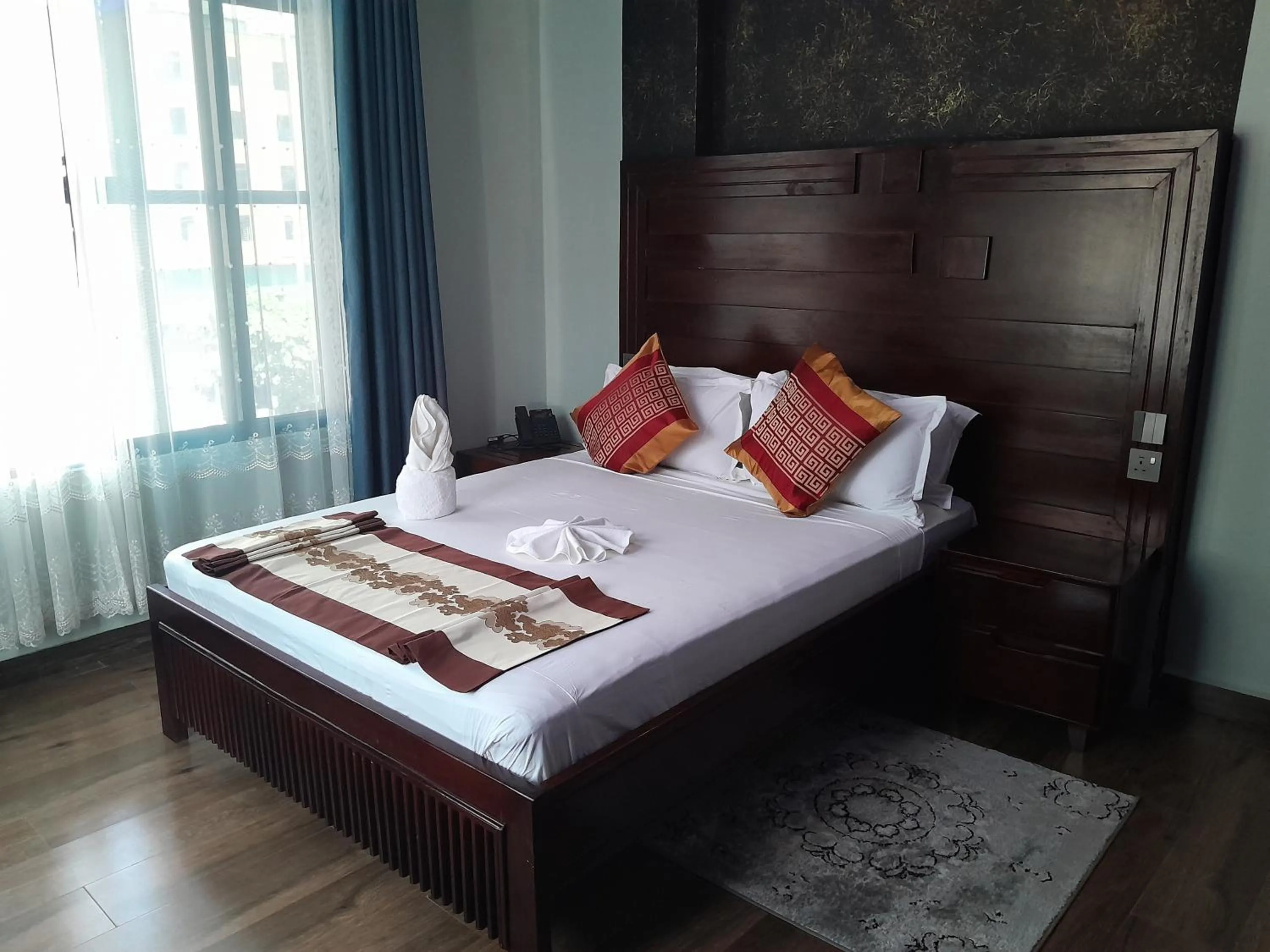 Bed in Mazola Diamond Hotel