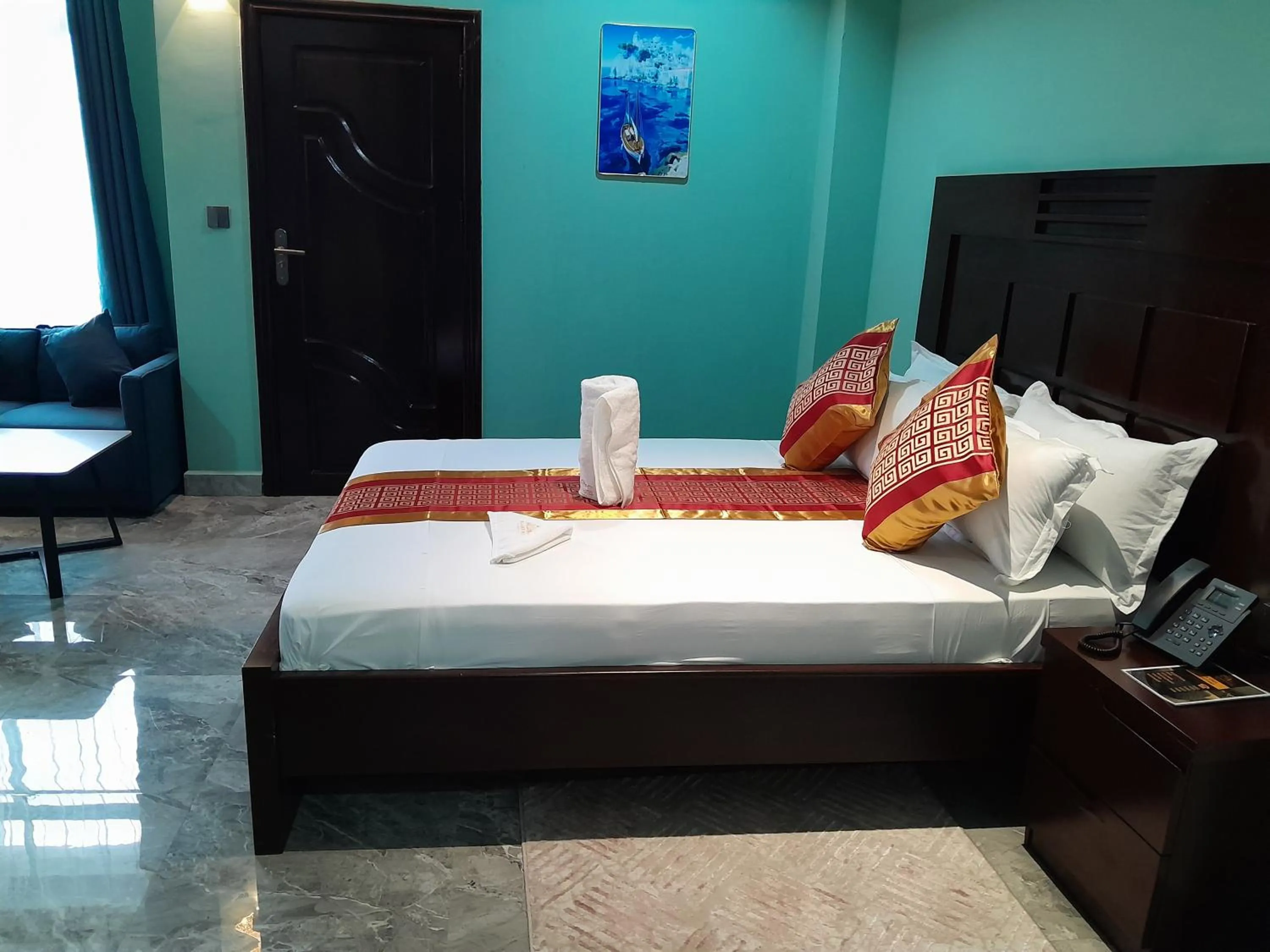 Bed in Mazola Diamond Hotel